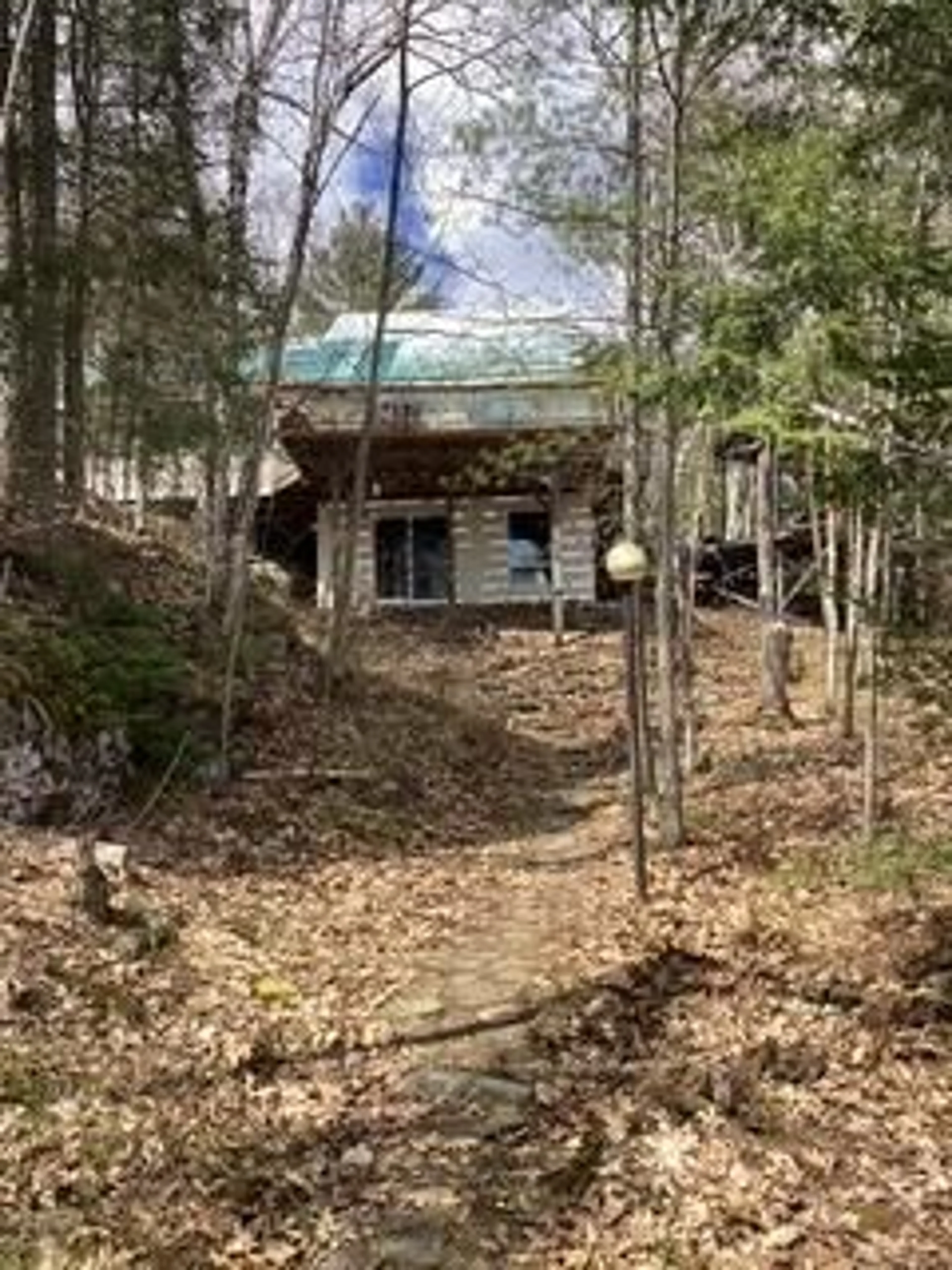 A pic from outside/outdoor area/front of a property/back of a property/a pic from drone, forest/trees view for 422 Duck Lake, Parry Sound Remote Area Ontario P0H 1Y0