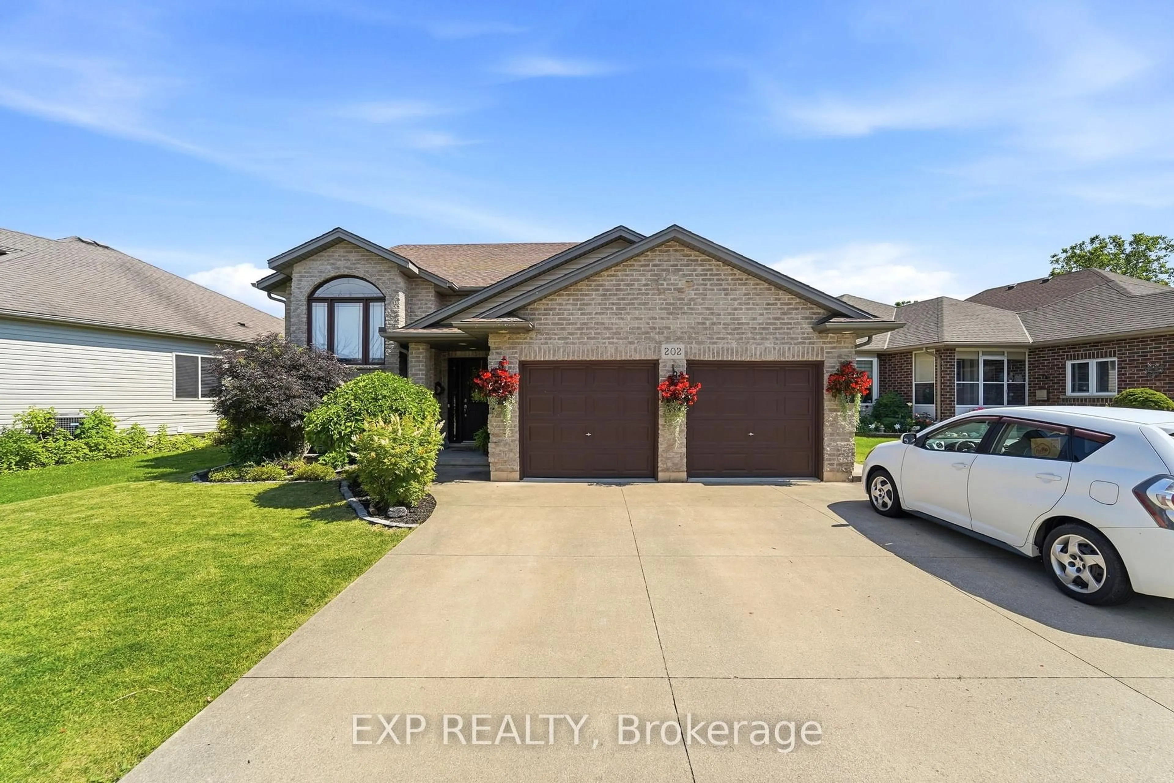 Home with brick exterior material, street for 202 Wellbrook Blvd, Welland Ontario L3C 7M9