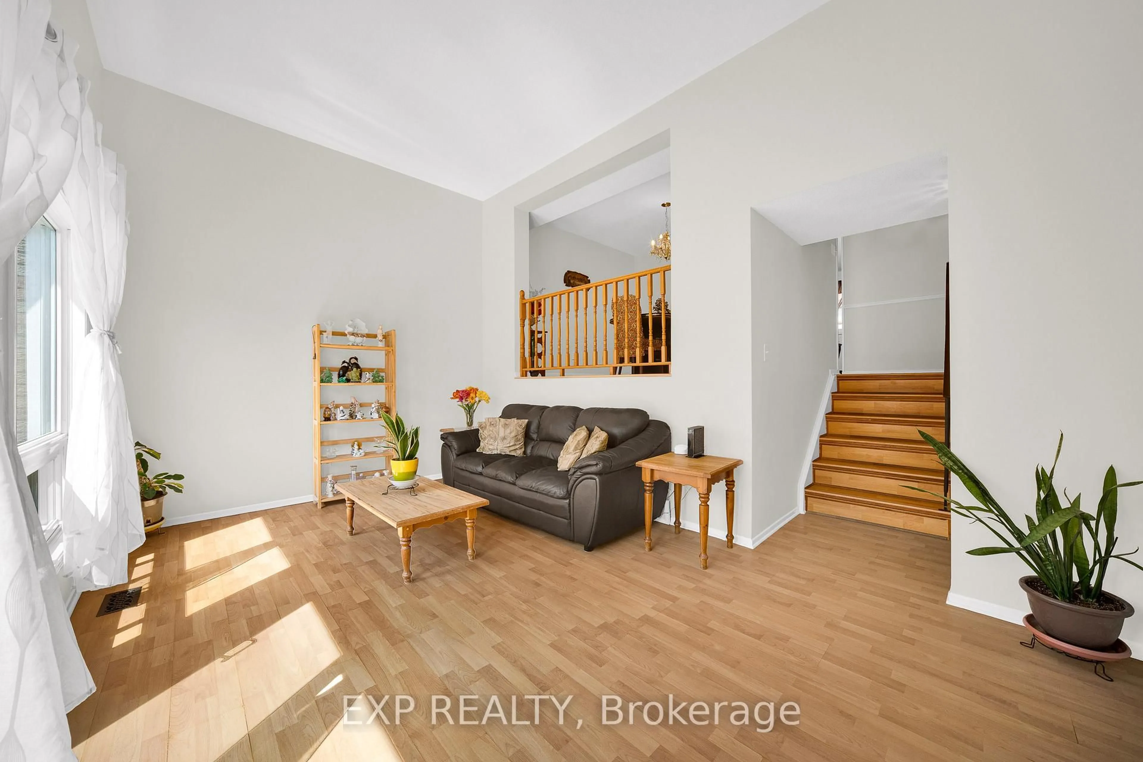 Living room with furniture, wood/laminate floor for 2 Bertona St #6, Ottawa Ontario K2G 0W2