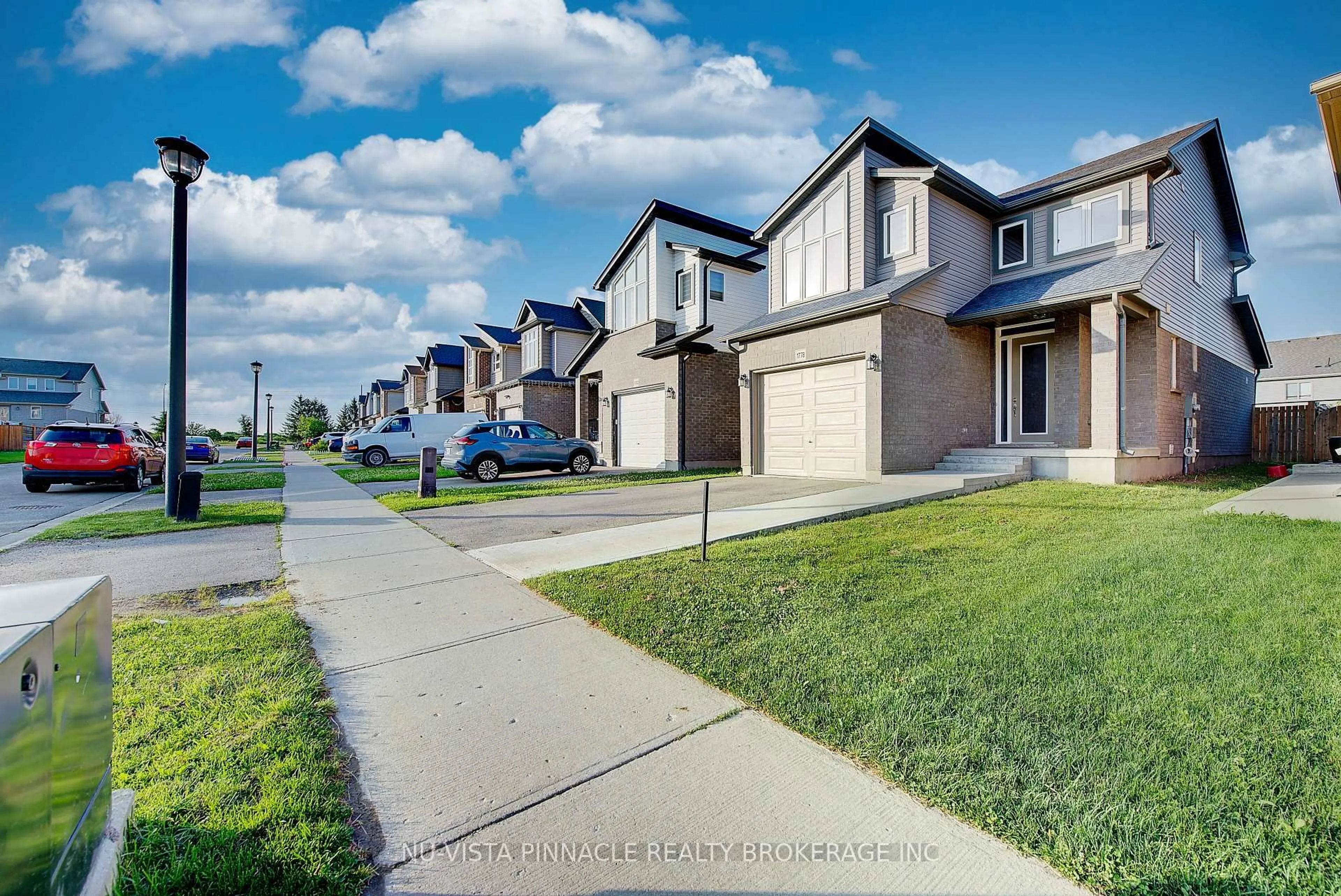 A pic from outside/outdoor area/front of a property/back of a property/a pic from drone, street for 1778 Aukett Dr, London North Ontario N5X 0N1