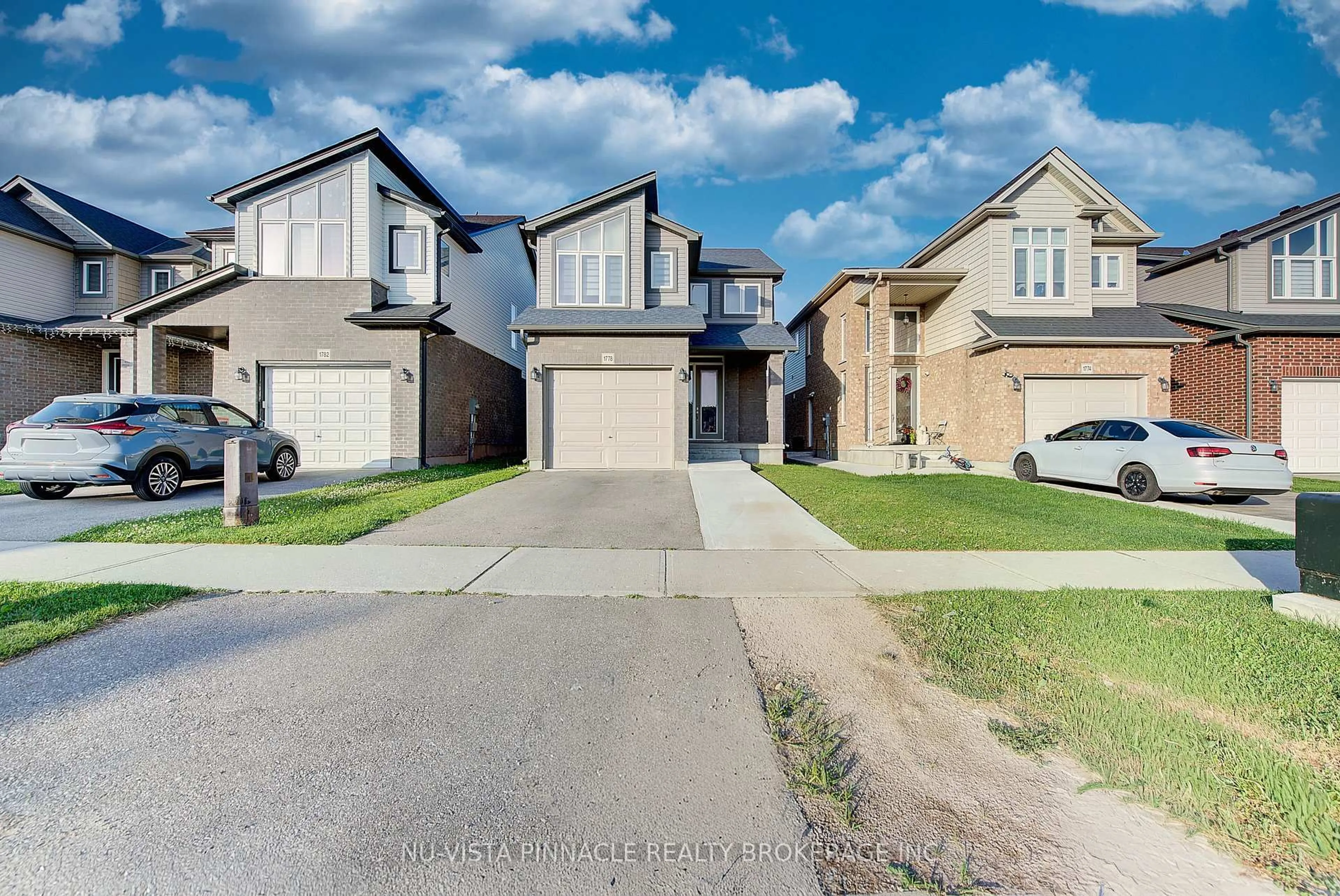 A pic from outside/outdoor area/front of a property/back of a property/a pic from drone, street for 1778 Aukett Dr, London North Ontario N5X 0N1