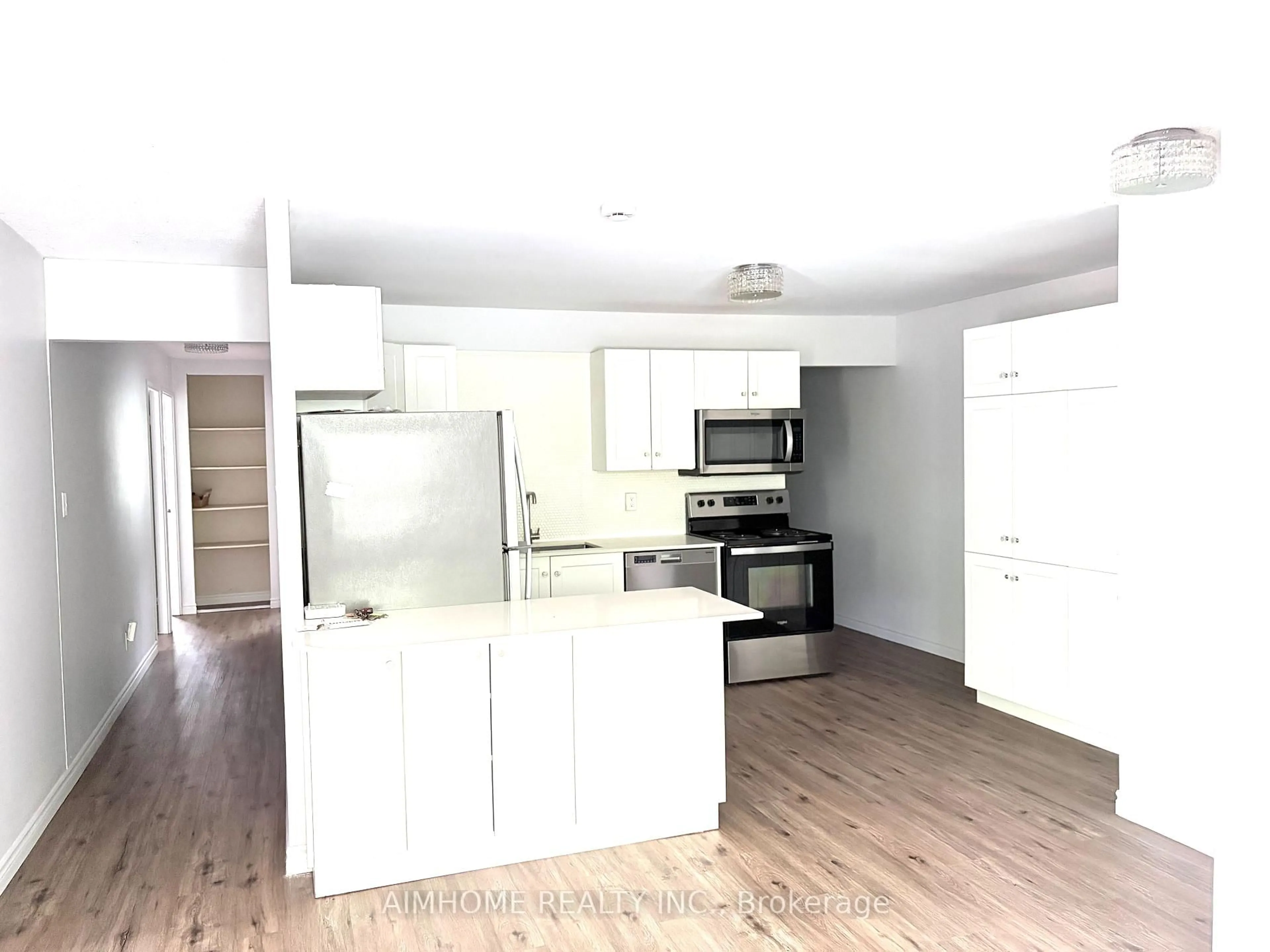 Open concept kitchen, wood/laminate floor for 109 Westmount Rd, Waterloo Ontario N2L 5G5