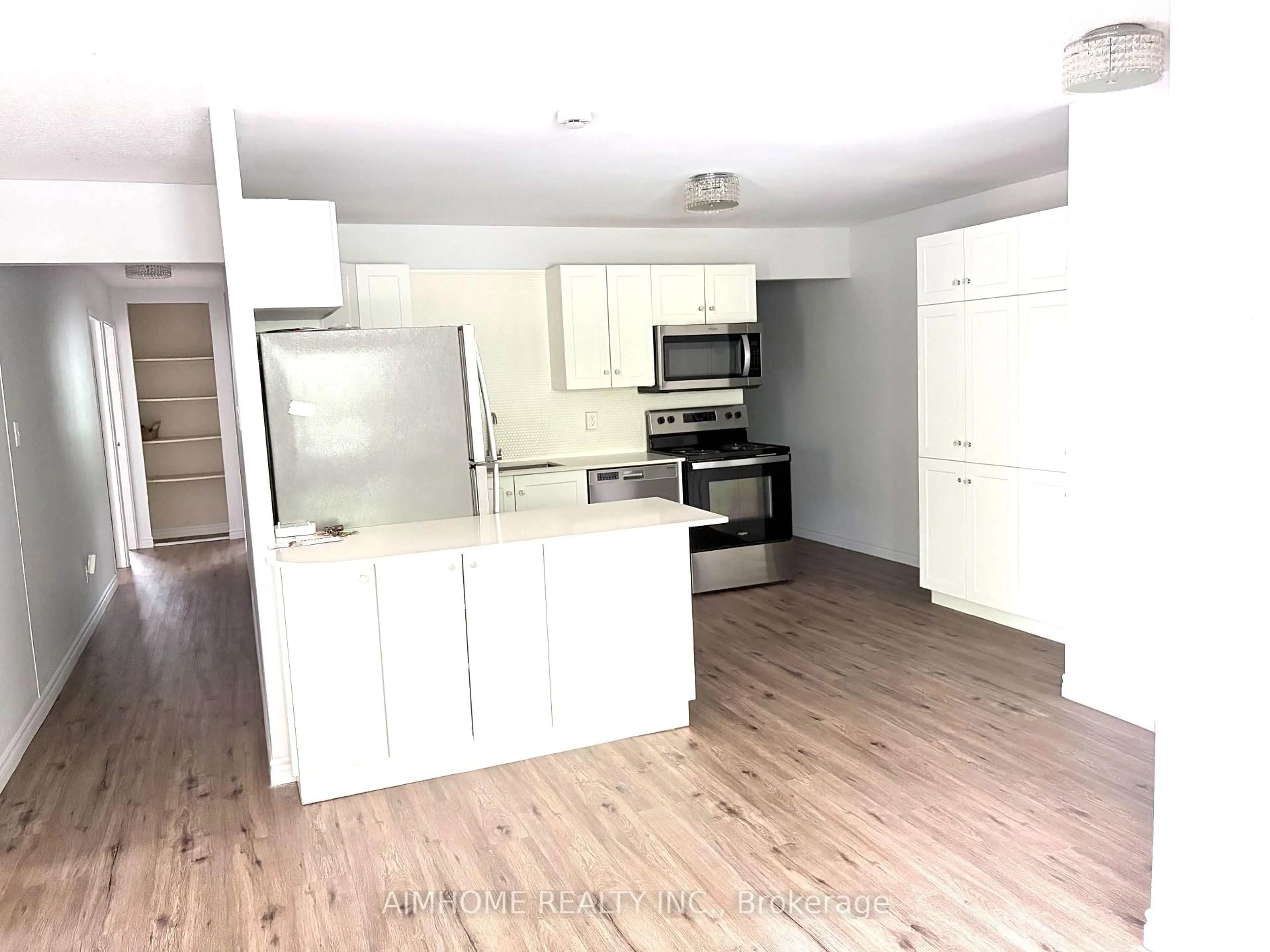 Open concept kitchen, wood/laminate floor for 109 Westmount Rd, Waterloo Ontario N2L 5G5