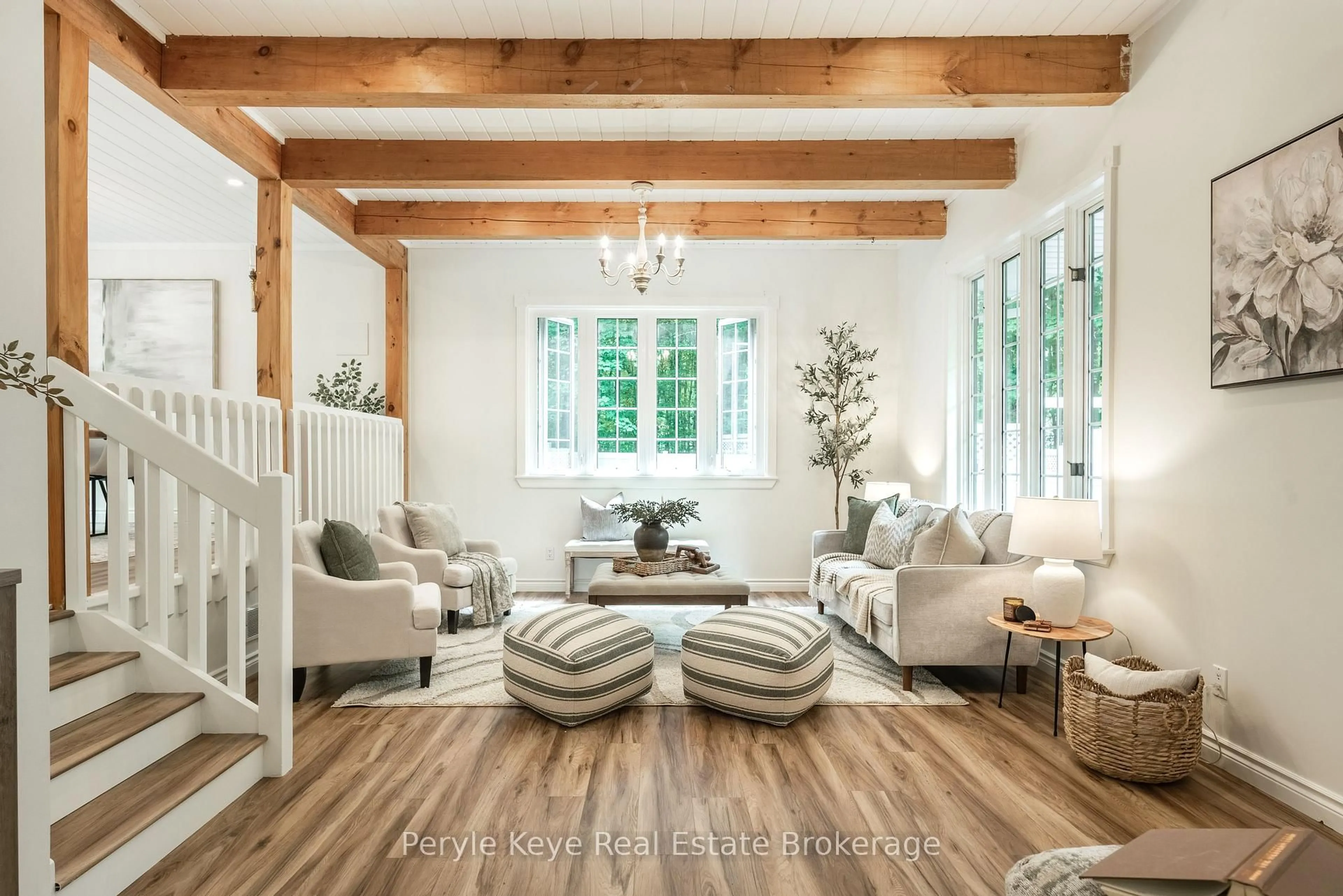 Living room with furniture, wood/laminate floor for 125 Clarke Cres, Huntsville Ontario P0B 1L0