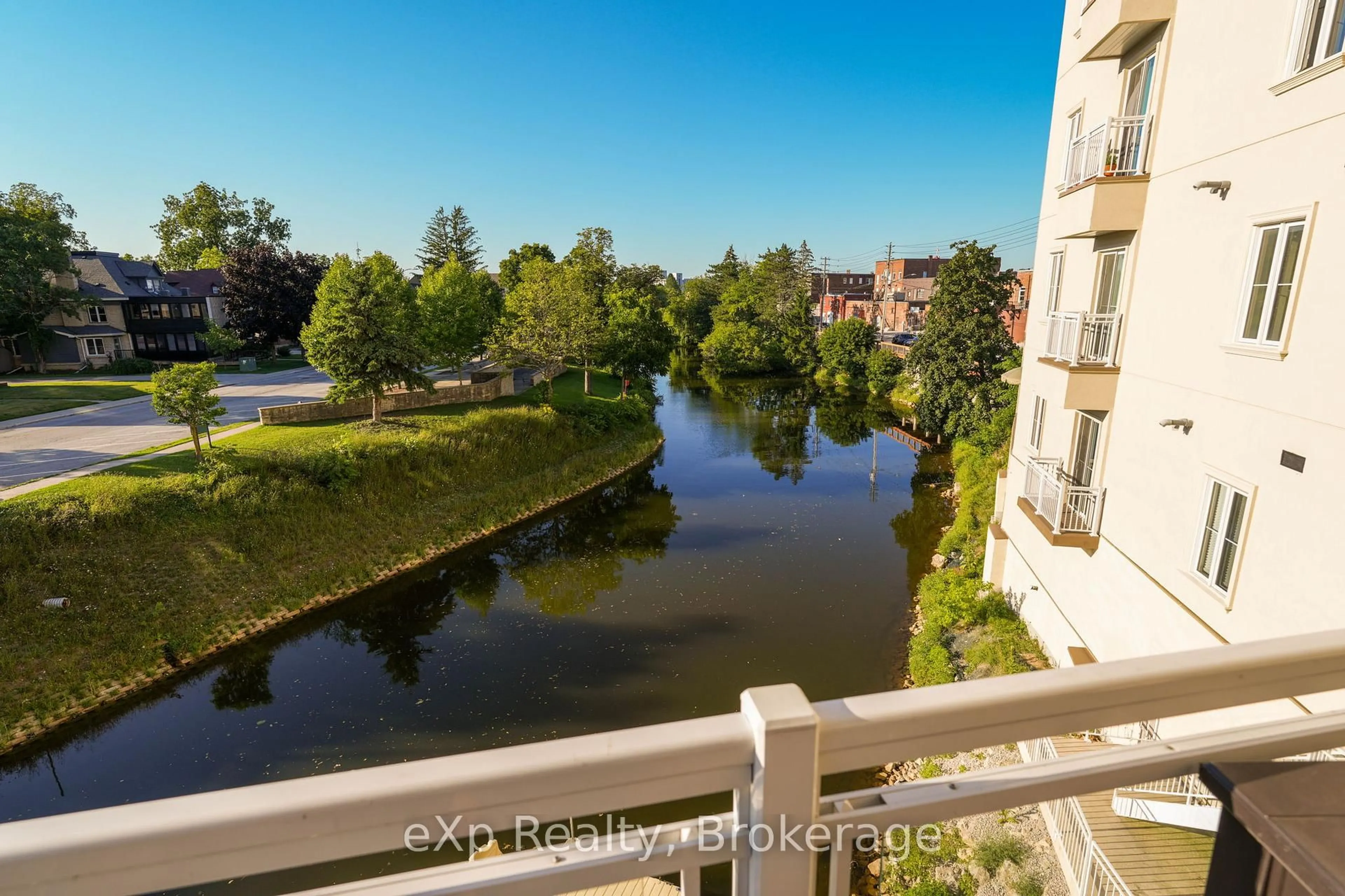 A pic from outside/outdoor area/front of a property/back of a property/a pic from drone, water/lake/river/ocean view for 80 9th St #203, Owen Sound Ontario N4K 1N4