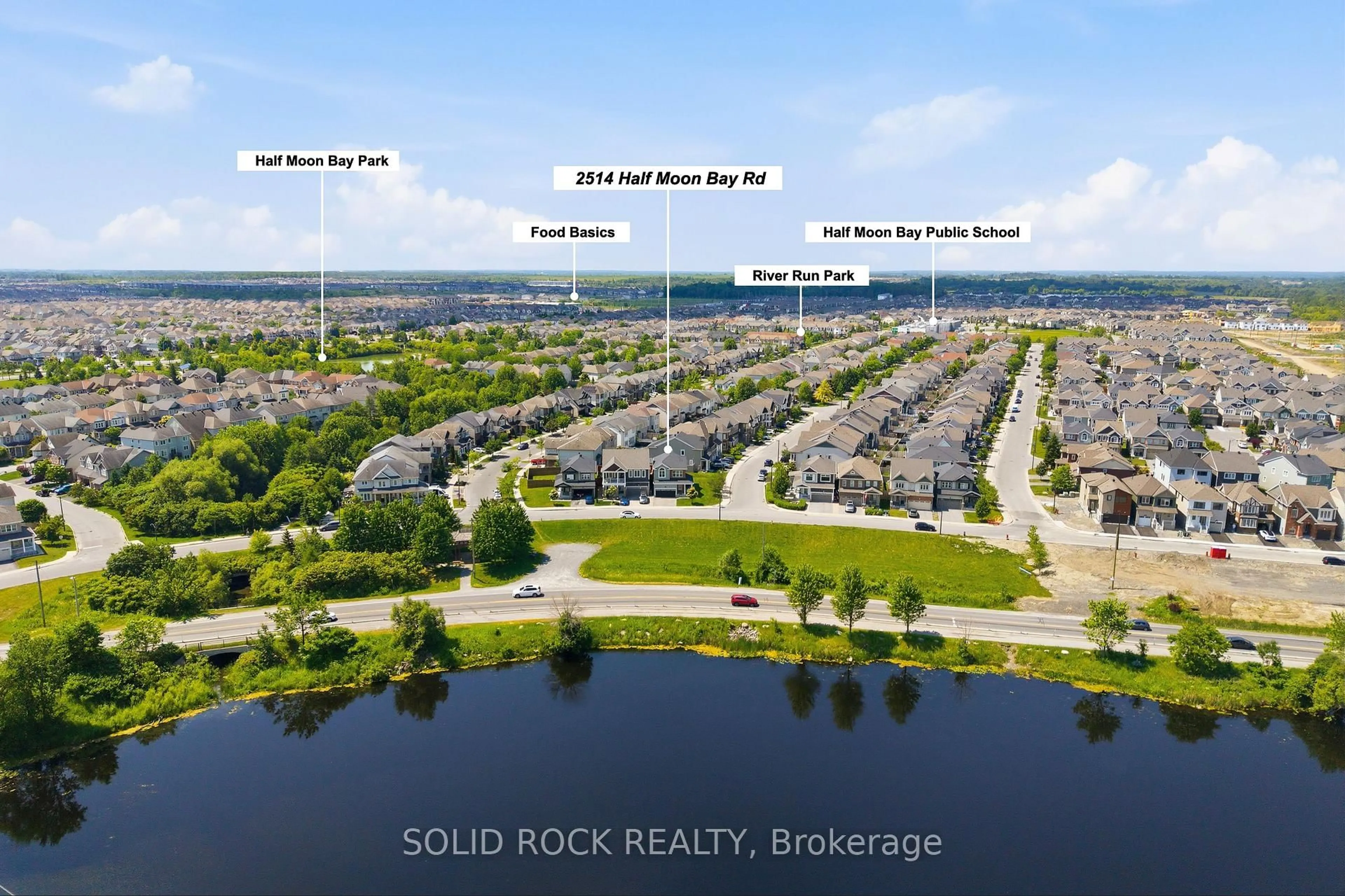 A pic from outside/outdoor area/front of a property/back of a property/a pic from drone, water/lake/river/ocean view for 2514 Half Moon Bay Rd, Ottawa Ontario K2M 2N2