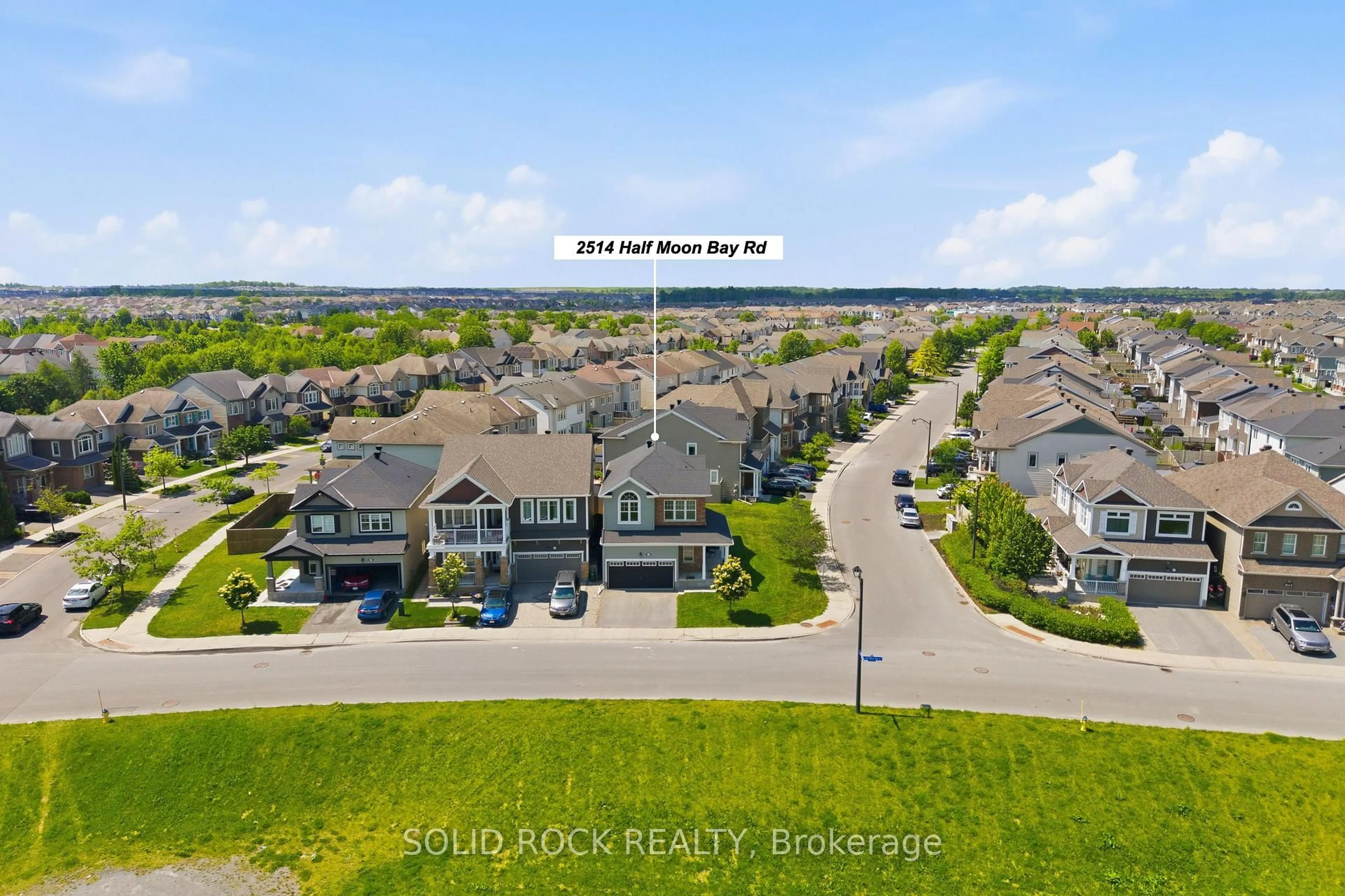A pic from outside/outdoor area/front of a property/back of a property/a pic from drone, water/lake/river/ocean view for 2514 Half Moon Bay Rd, Ottawa Ontario K2M 2N2