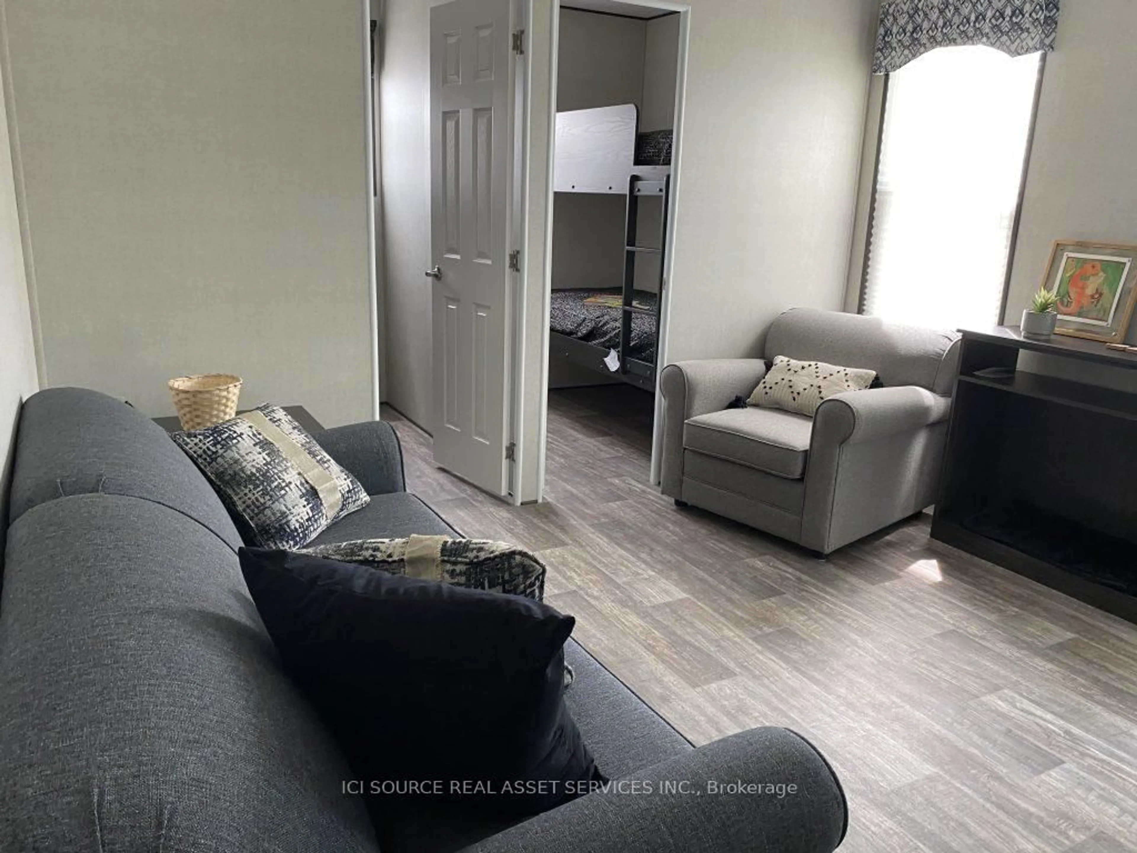 Living room with furniture, unknown for 1235 Villiers Line #RL031, Otonabee-South Monaghan Ontario K0L 2G0