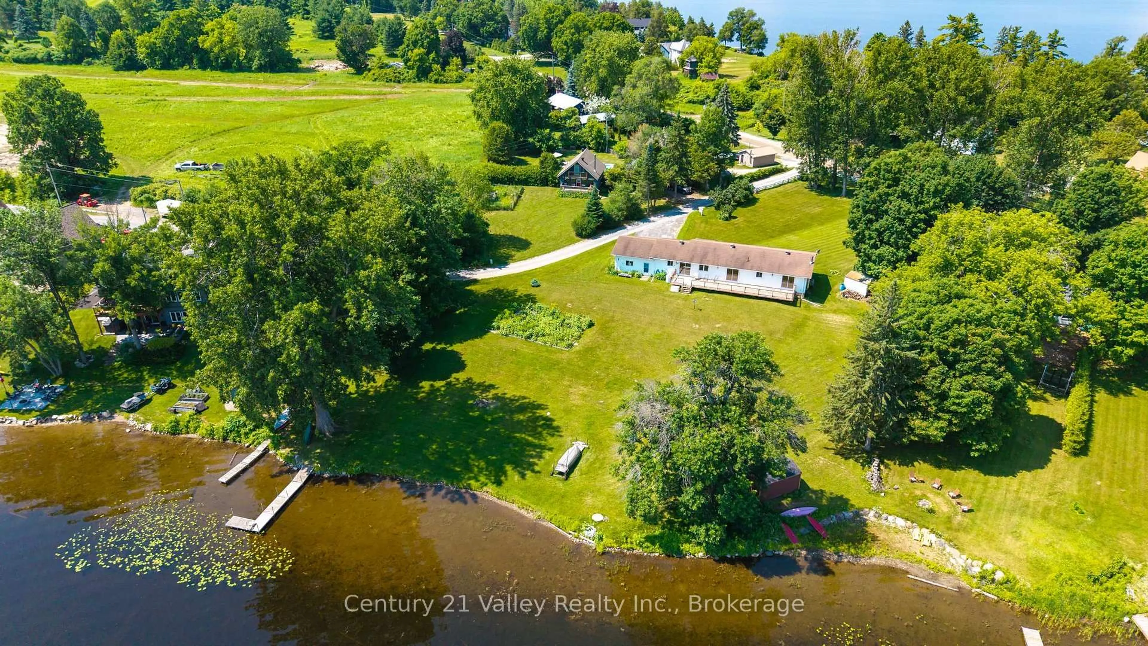 A pic from outside/outdoor area/front of a property/back of a property/a pic from drone, water/lake/river/ocean view for 11 Hart Lane, Calabogie Ontario K0J 1H0