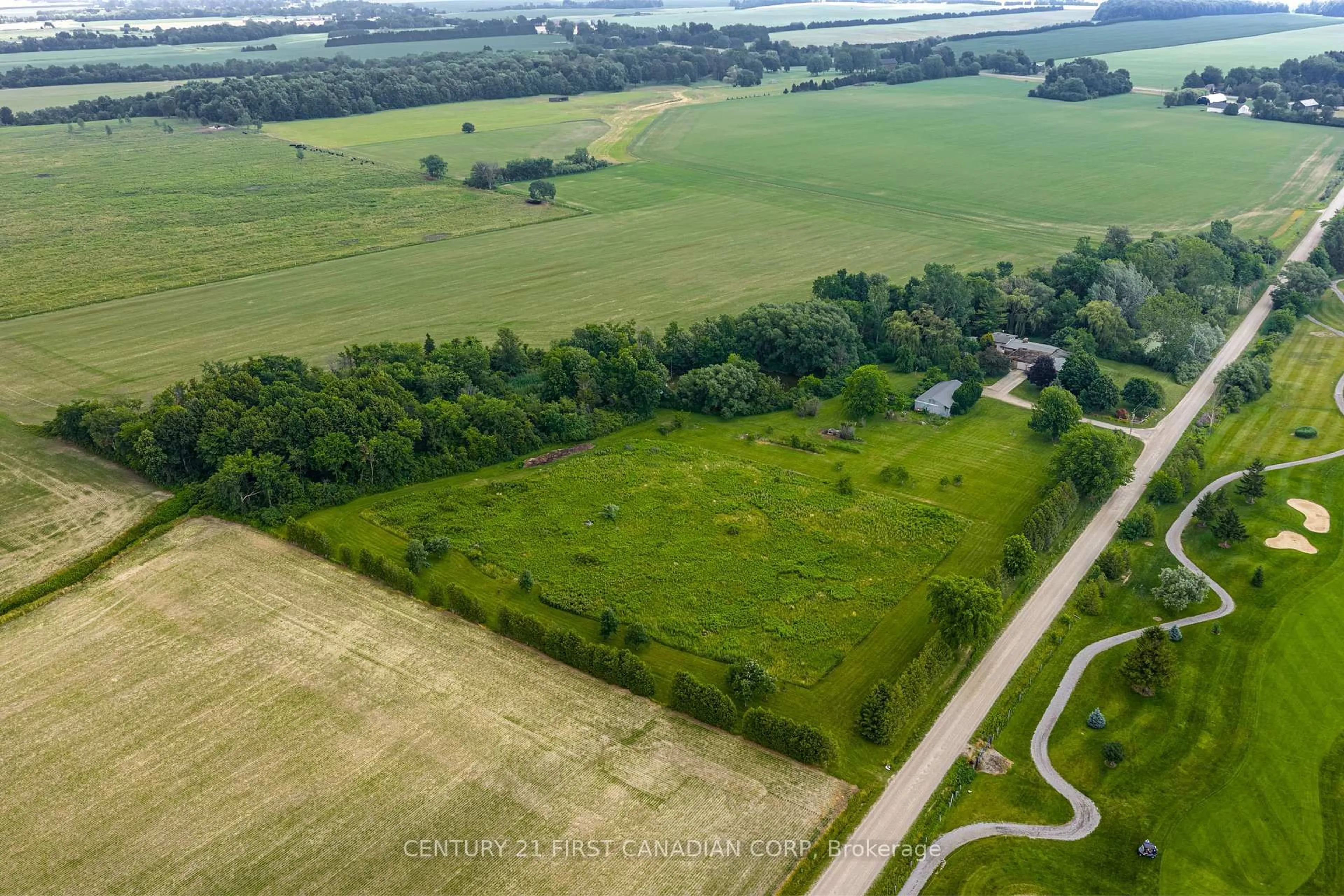 A pic from outside/outdoor area/front of a property/back of a property/a pic from drone, unknown for 19429 Harwich Rd, Chatham-Kent Ontario N0P 1A0