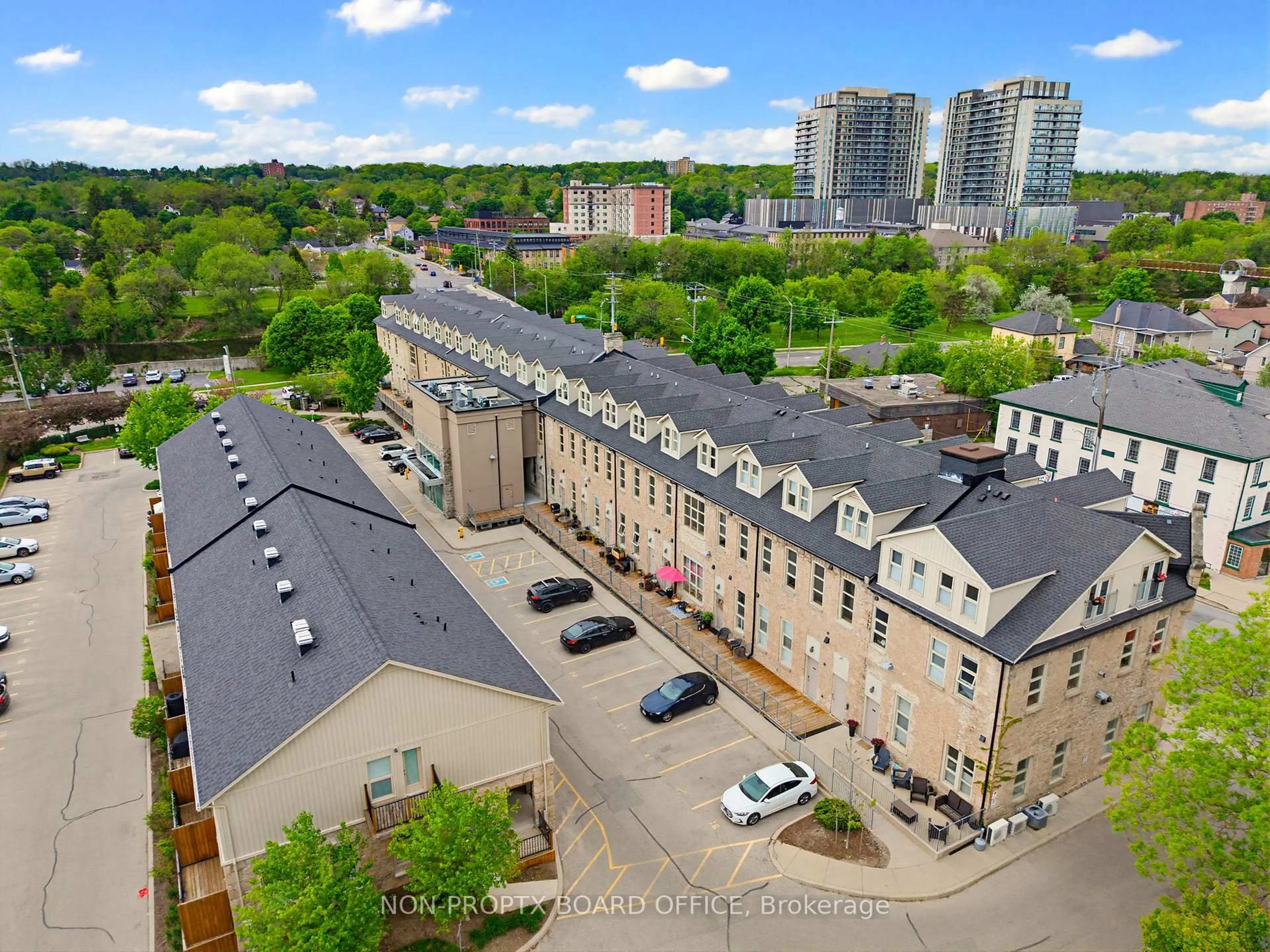 A pic from outside/outdoor area/front of a property/back of a property/a pic from drone, city buildings view from balcony for 25 Concession St #111, Cambridge Ontario N1R 2G6