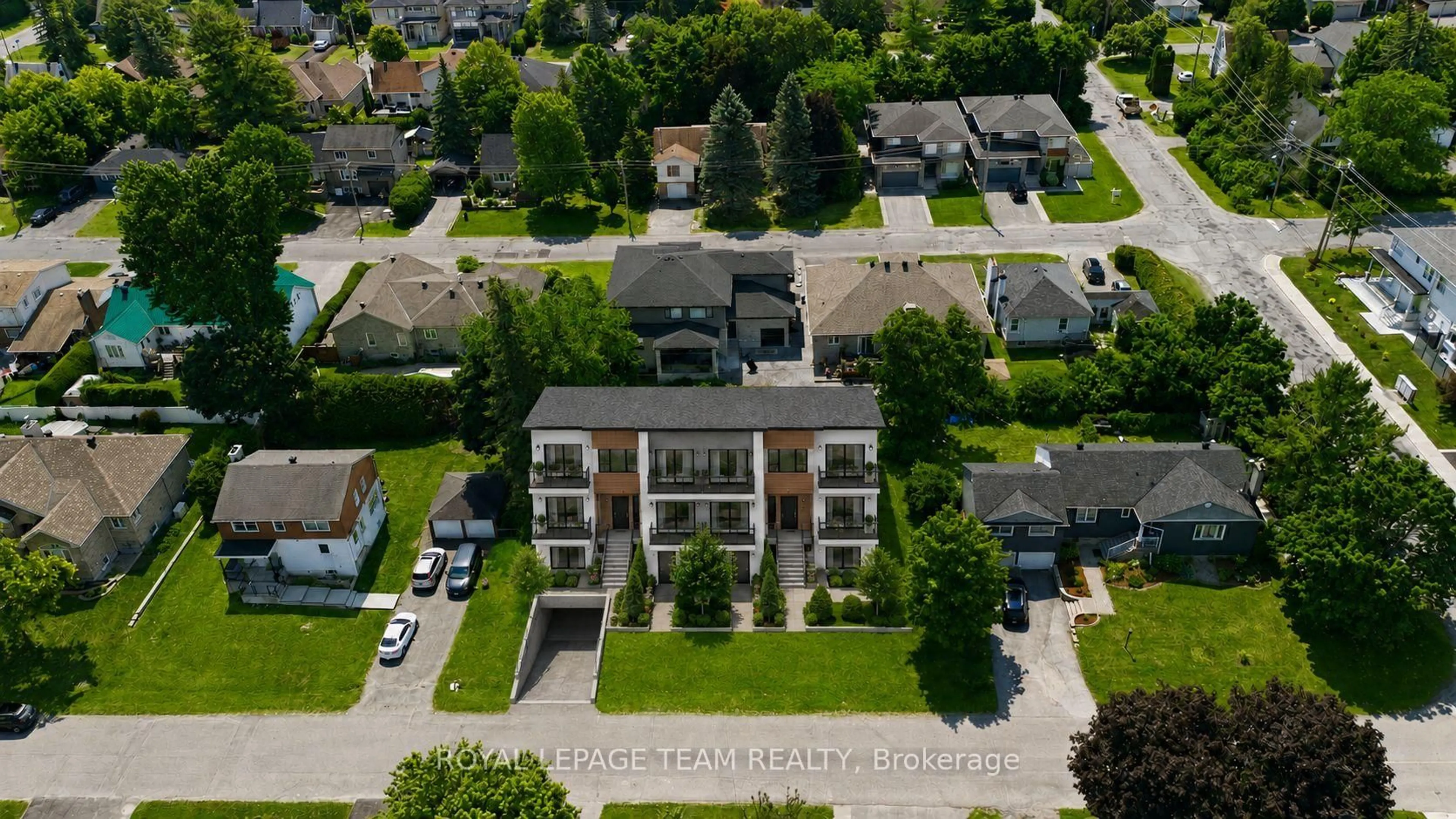 A pic from outside/outdoor area/front of a property/back of a property/a pic from drone, street for 84 Rita Ave, Ottawa Ontario K2G 2H1