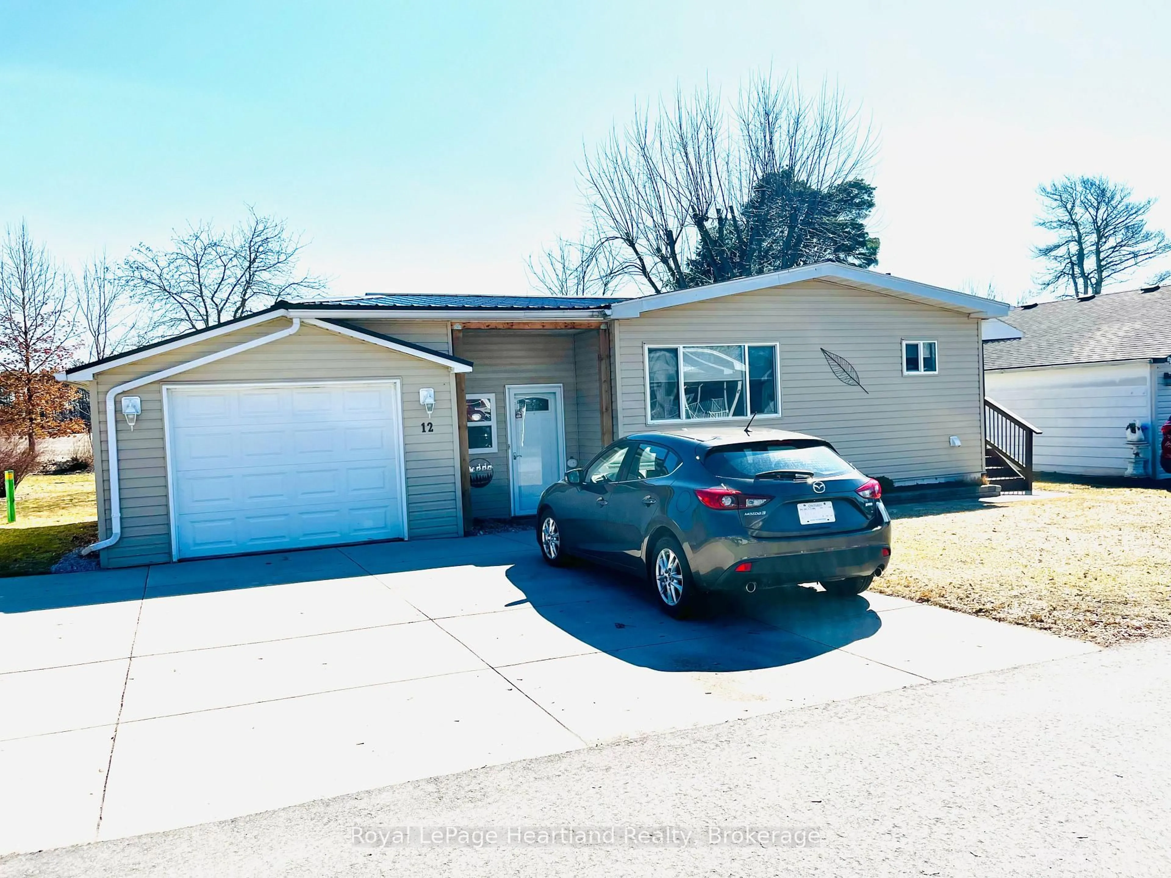 Home with vinyl exterior material, street for 12 Velma St, Strathroy-Caradoc Ontario N7G 3L3