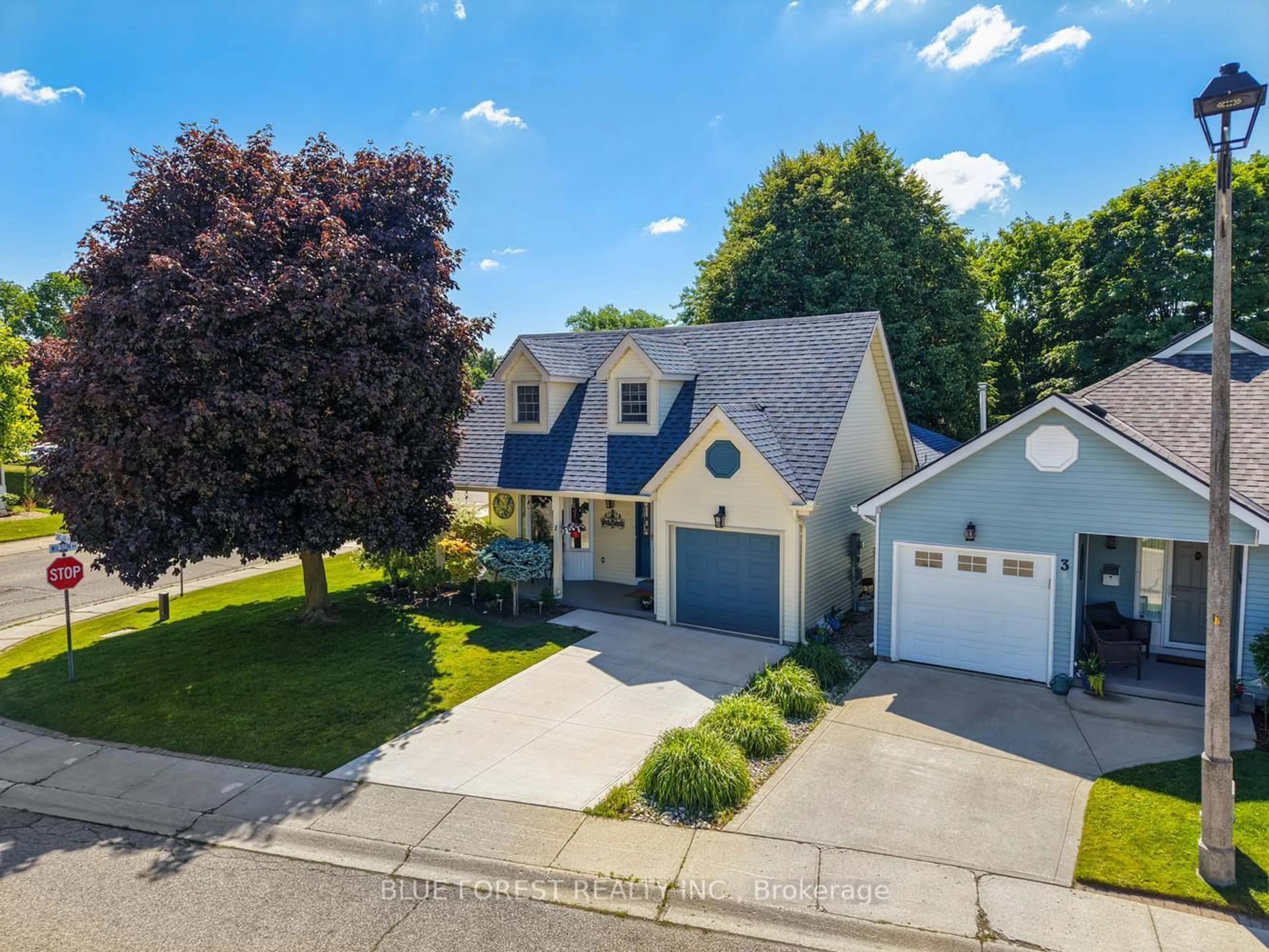 A pic from outside/outdoor area/front of a property/back of a property/a pic from drone, street for 1 Sinclair Dr, Tillsonburg Ontario N4G 5L6