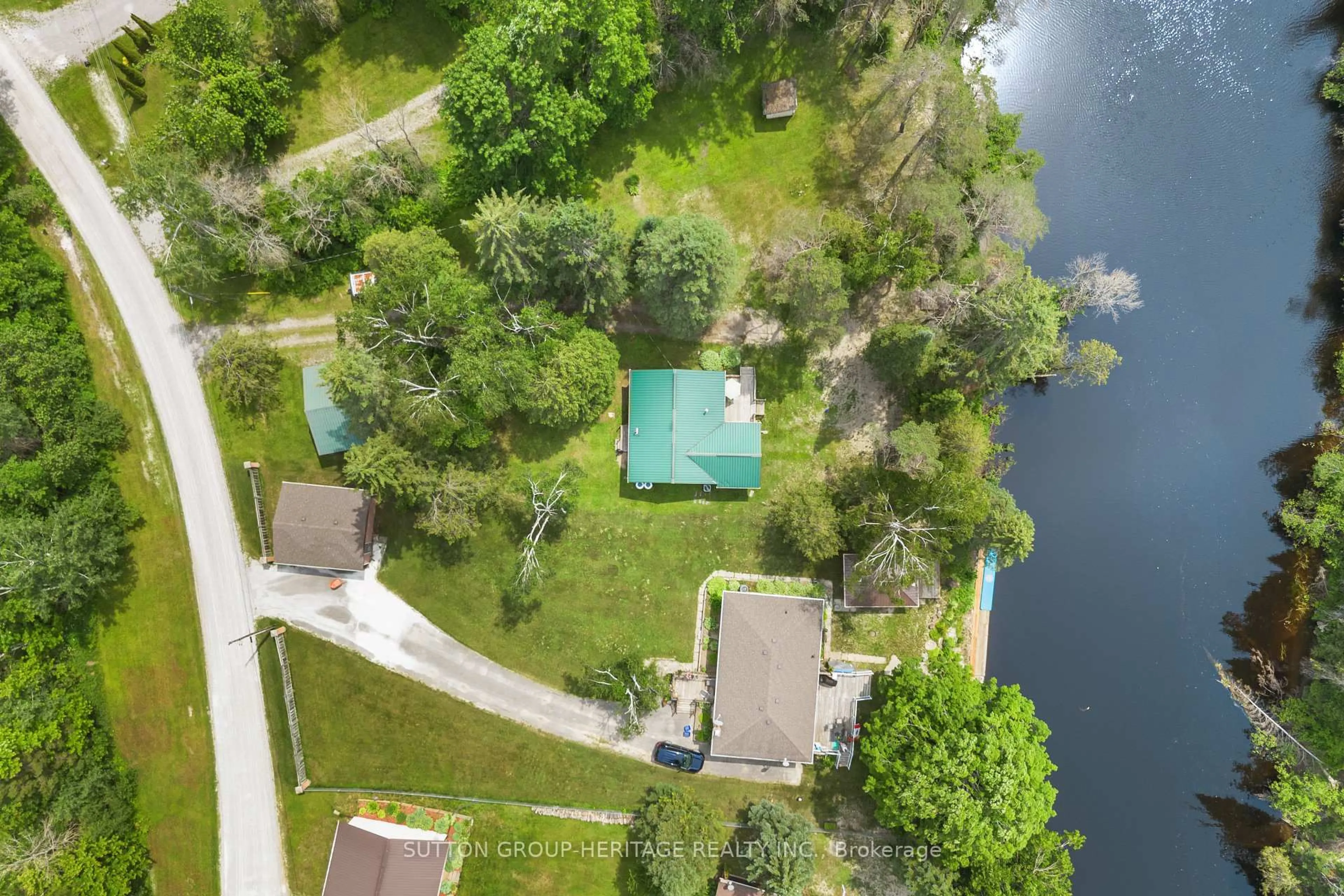 A pic from outside/outdoor area/front of a property/back of a property/a pic from drone, water/lake/river/ocean view for 11 Crooked Crt, Kawartha Lakes Ontario K0M 1C0