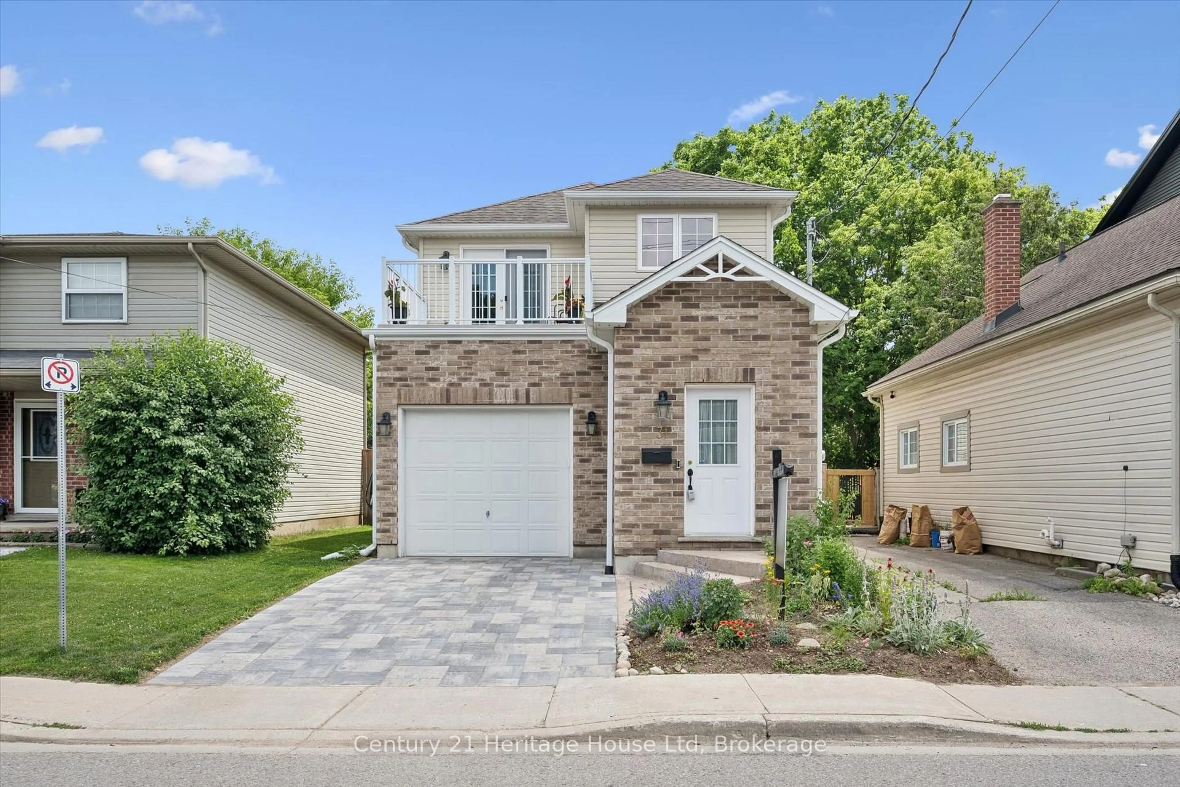 Home with brick exterior material, street for 31 Alice St, Guelph Ontario N1E 2Z7