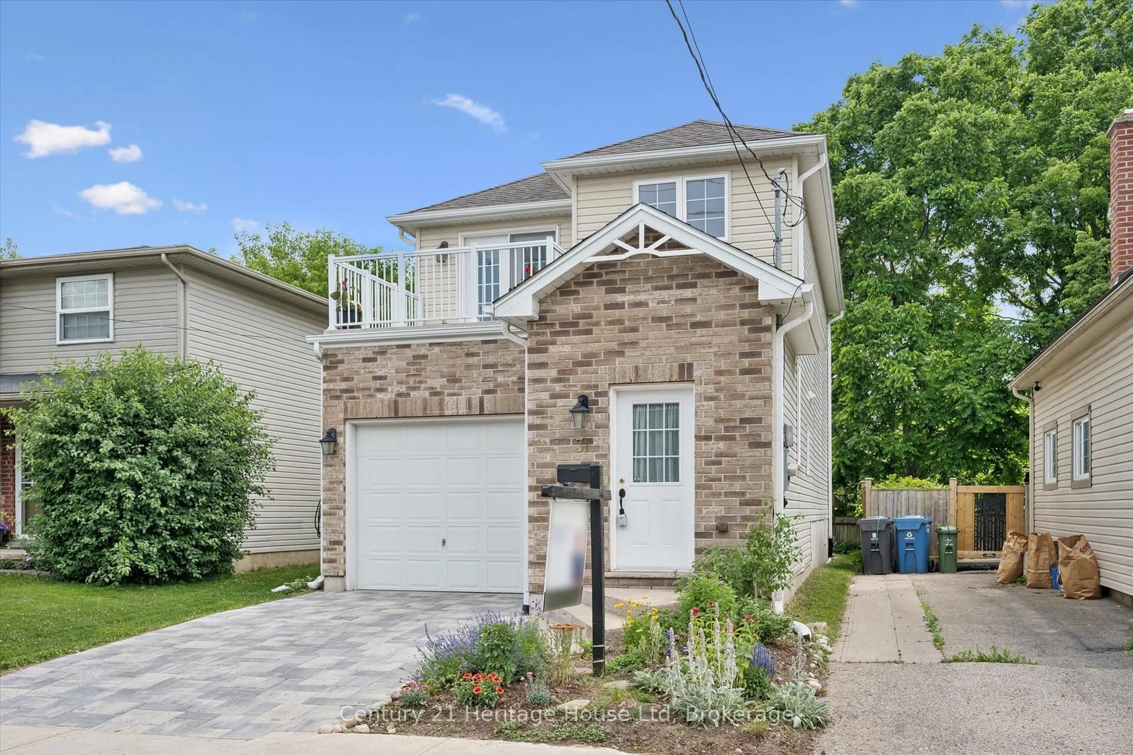 Home with brick exterior material, street for 31 Alice St, Guelph Ontario N1E 2Z7