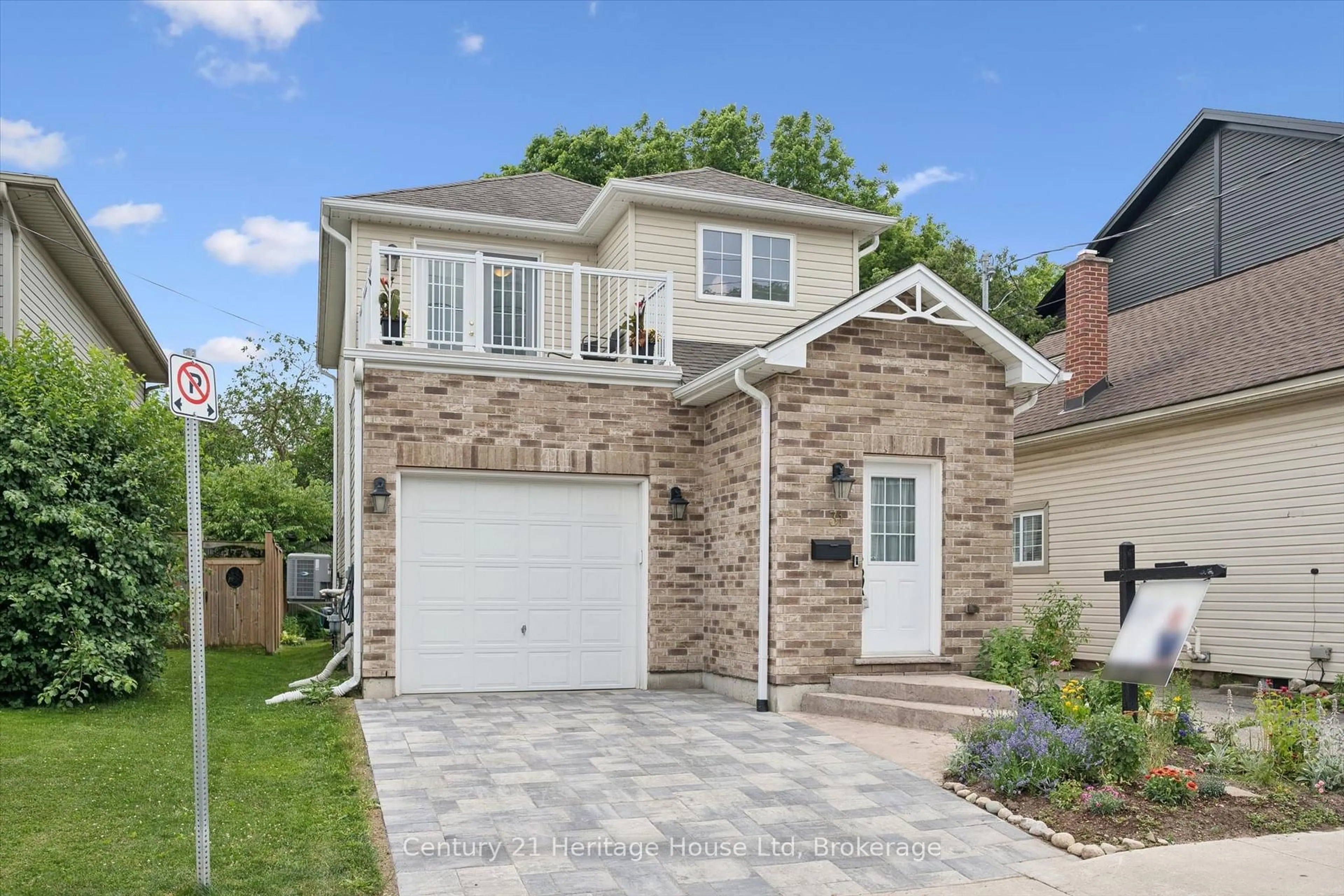 Home with brick exterior material, street for 31 Alice St, Guelph Ontario N1E 2Z7