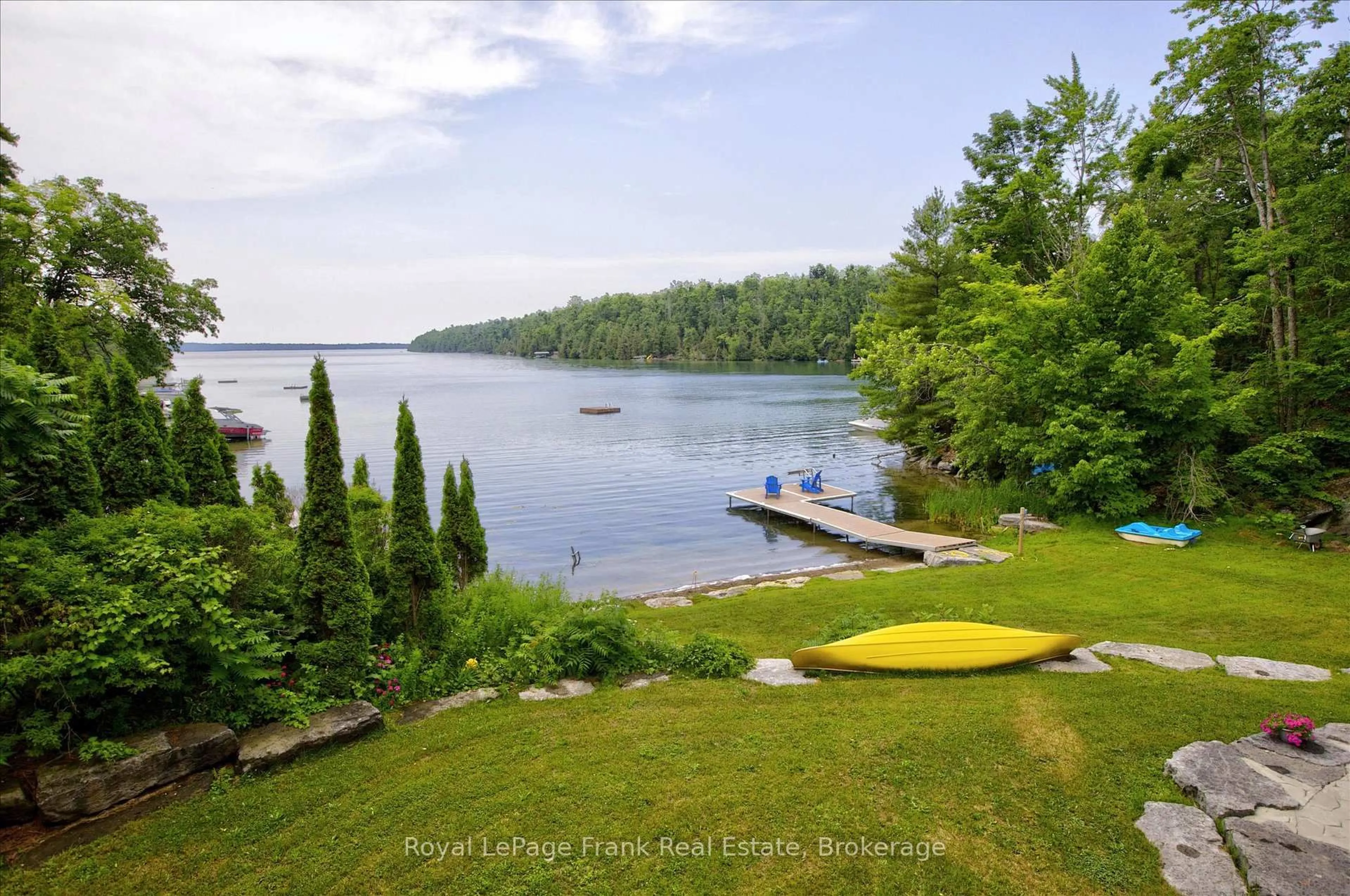A pic from outside/outdoor area/front of a property/back of a property/a pic from drone, water/lake/river/ocean view for 84 Fire Route 54, Trent Lakes Ontario K0L 1J0