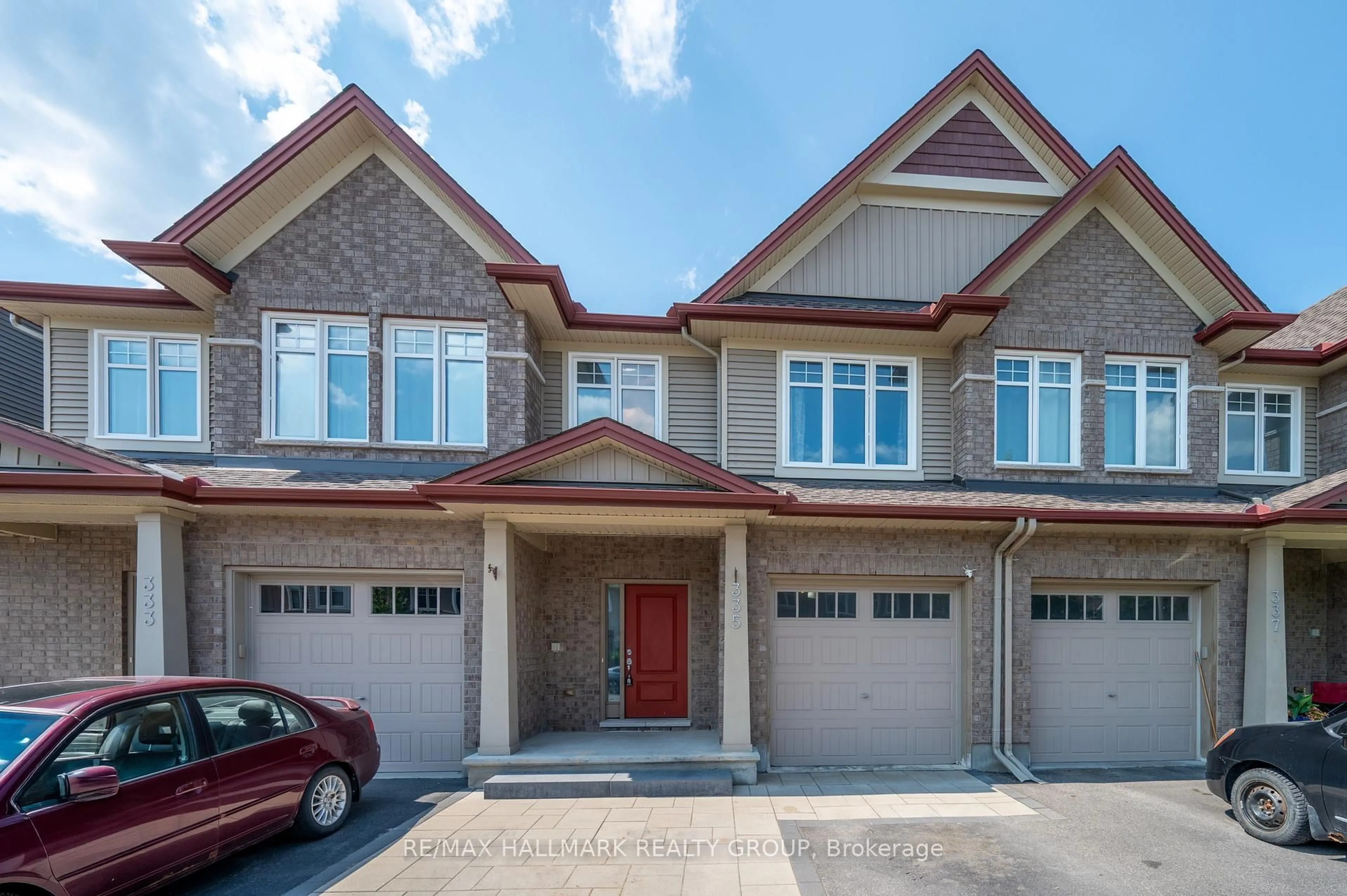 Home with brick exterior material, street for 335 Alasken Dr, Ottawa Ontario K1T 0M4