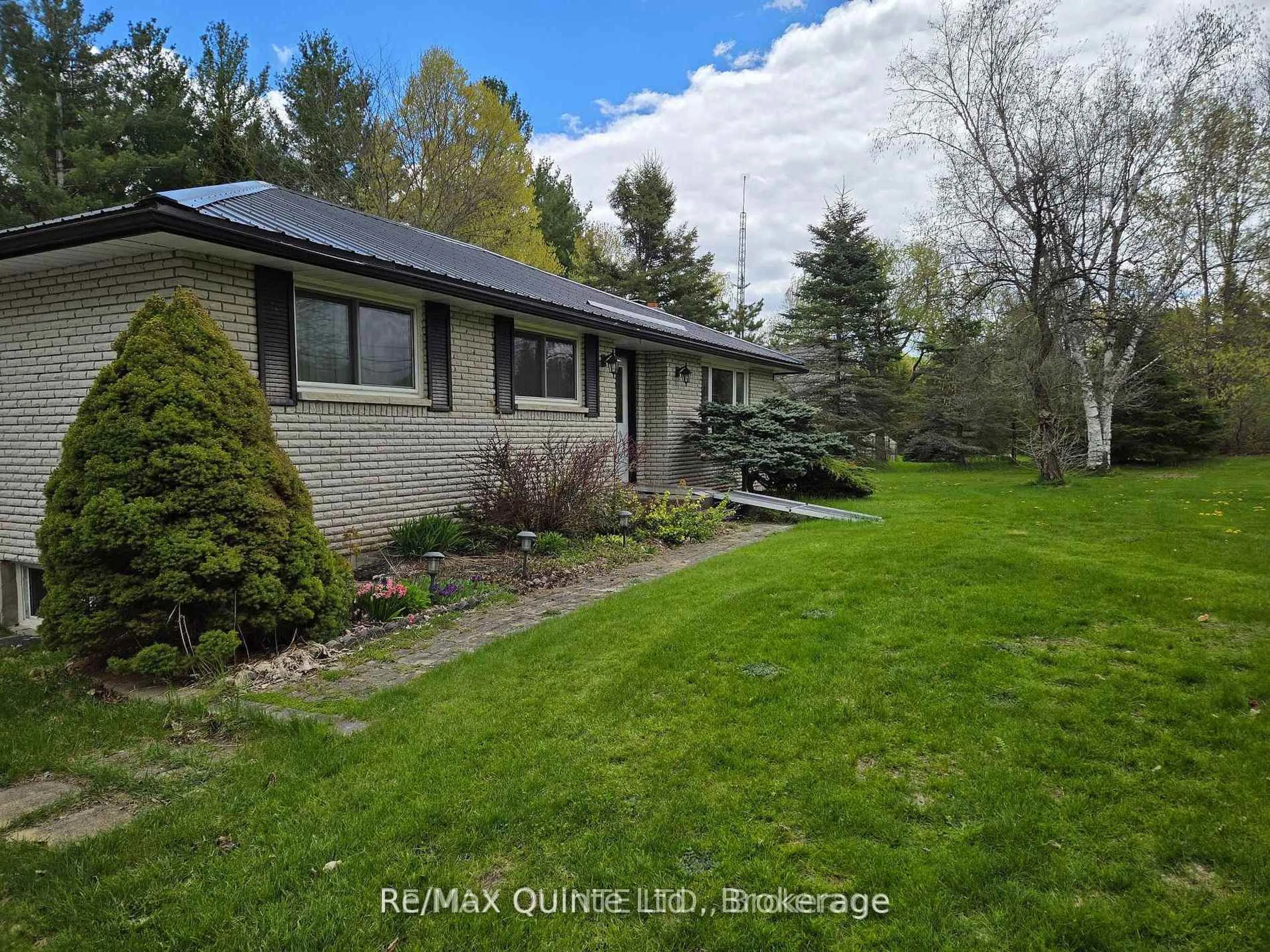A pic from outside/outdoor area/front of a property/back of a property/a pic from drone, water/lake/river/ocean view for 12180 HIGHWAY 62, Madoc Ontario K0K 2K0