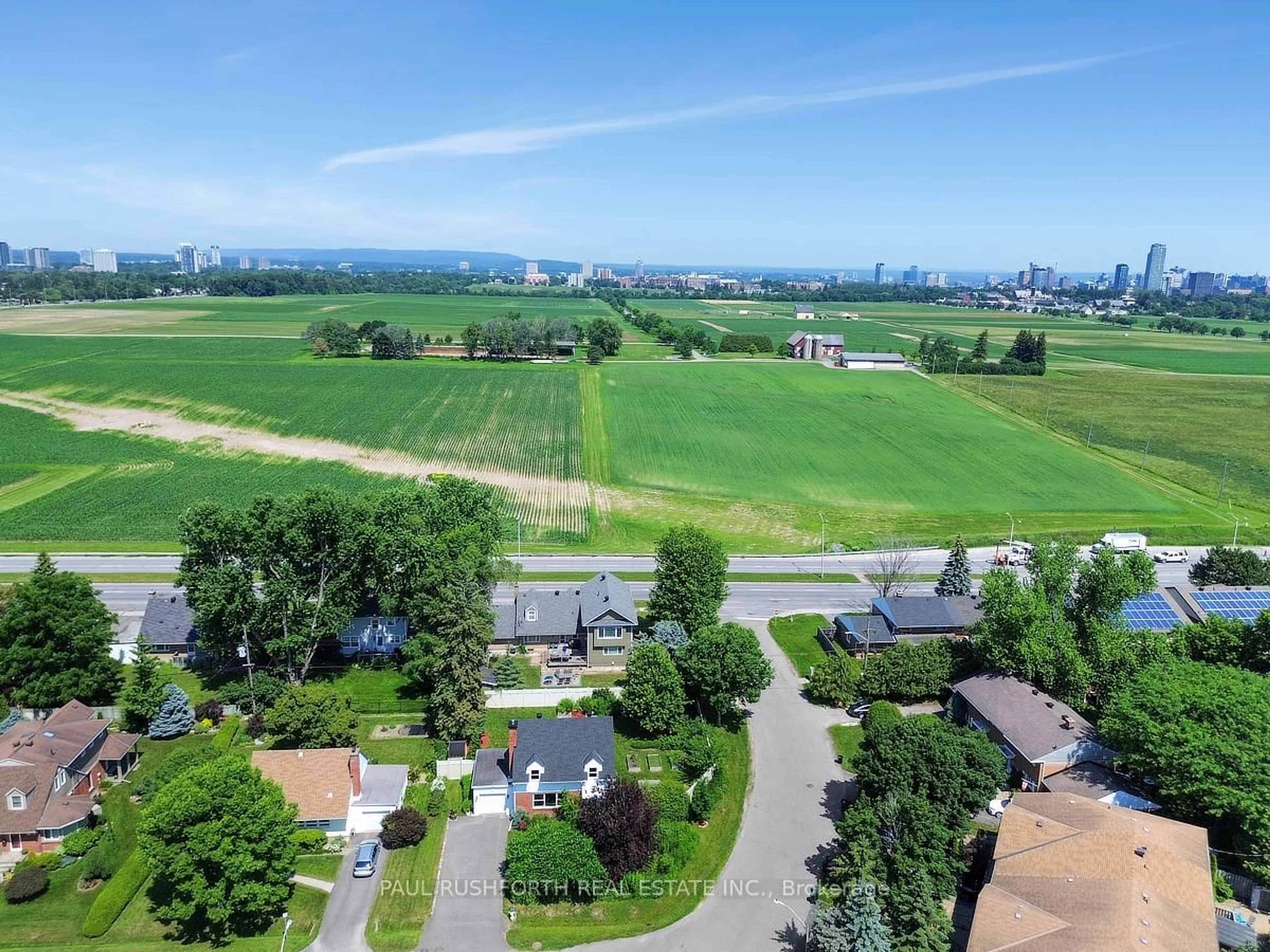 A pic from outside/outdoor area/front of a property/back of a property/a pic from drone, mountain view for 143 Wilshire Ave, Ottawa Ontario K2C 0E6