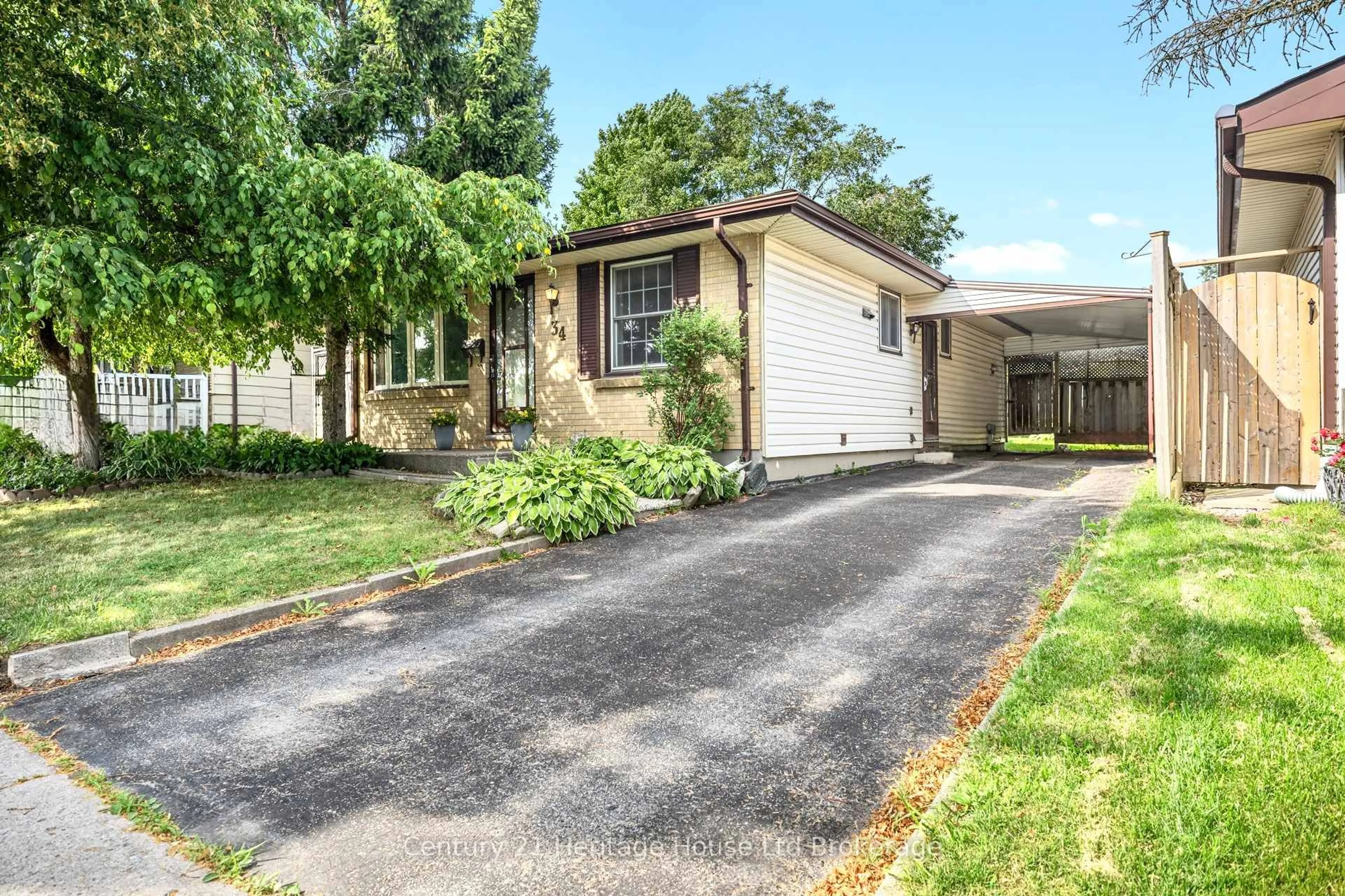 Home with brick exterior material, street for 34 Dudley Cres, London South Ontario N6E 1S4