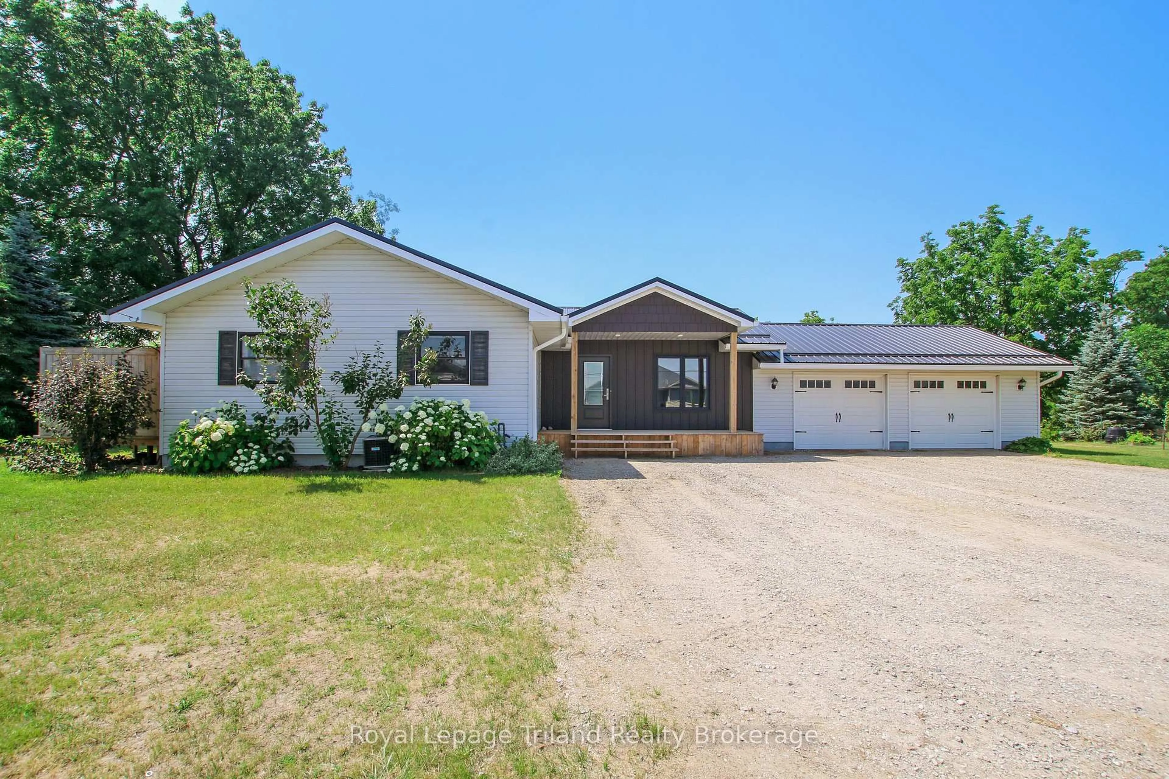 A pic from outside/outdoor area/front of a property/back of a property/a pic from drone, street for 56525 Heritage Line, Bayham Ontario N0J 1Y0