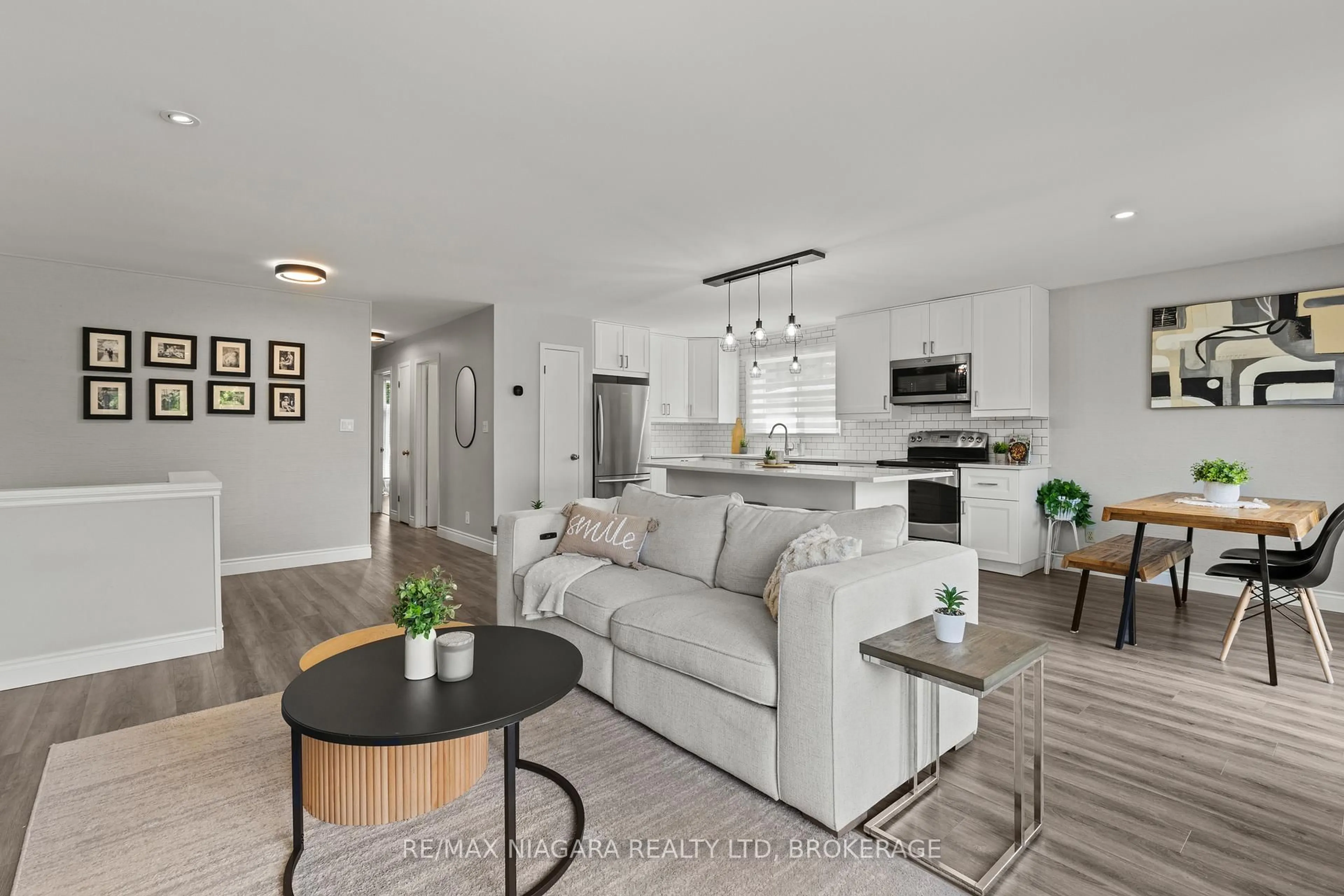 Living room with furniture, unknown for 14 The Cedars, St. Catharines Ontario L2M 6M8