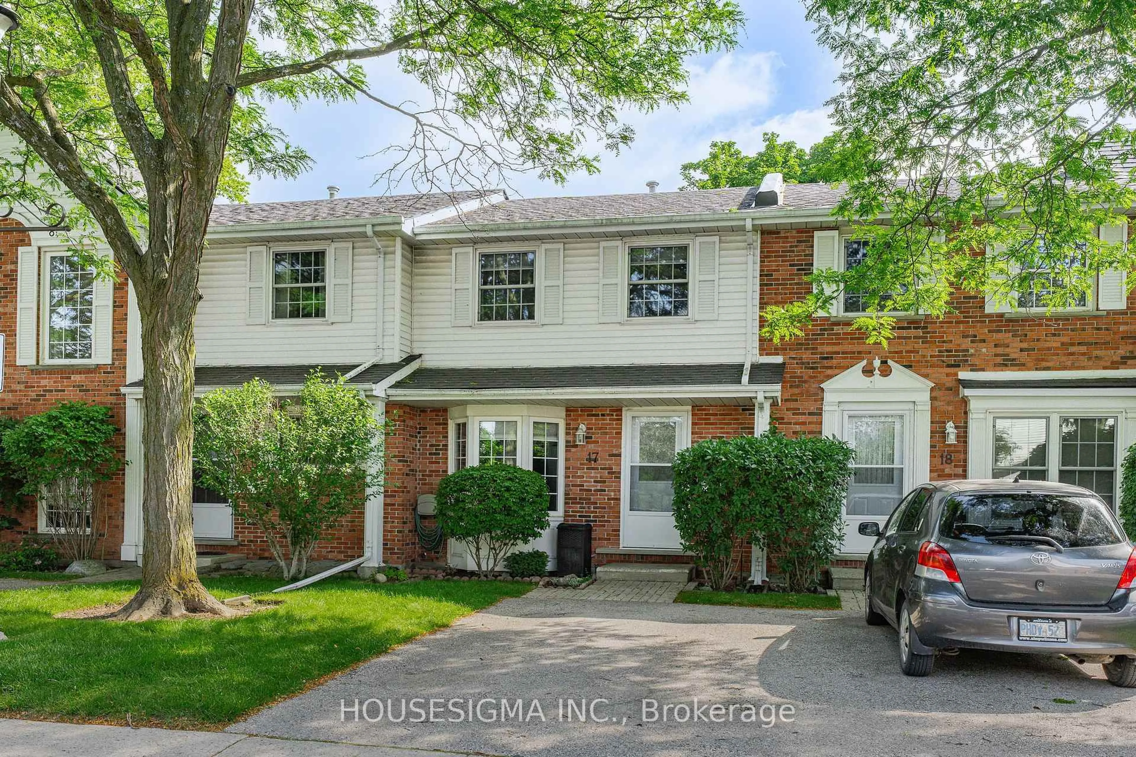 Home with brick exterior material, street for 129 Victoria Rd #17, Guelph Ontario N1E 6V3