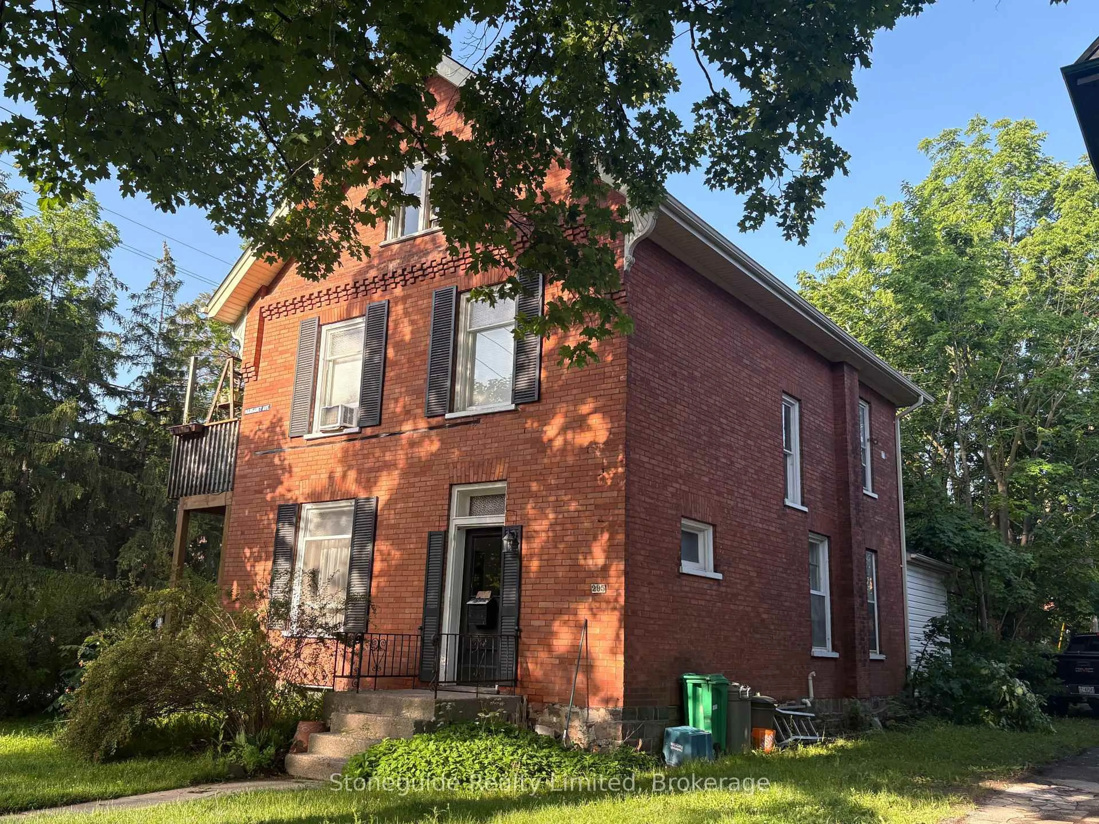 Home with brick exterior material, street for 295 Margaret Ave, Peterborough Ontario K9J 5H1