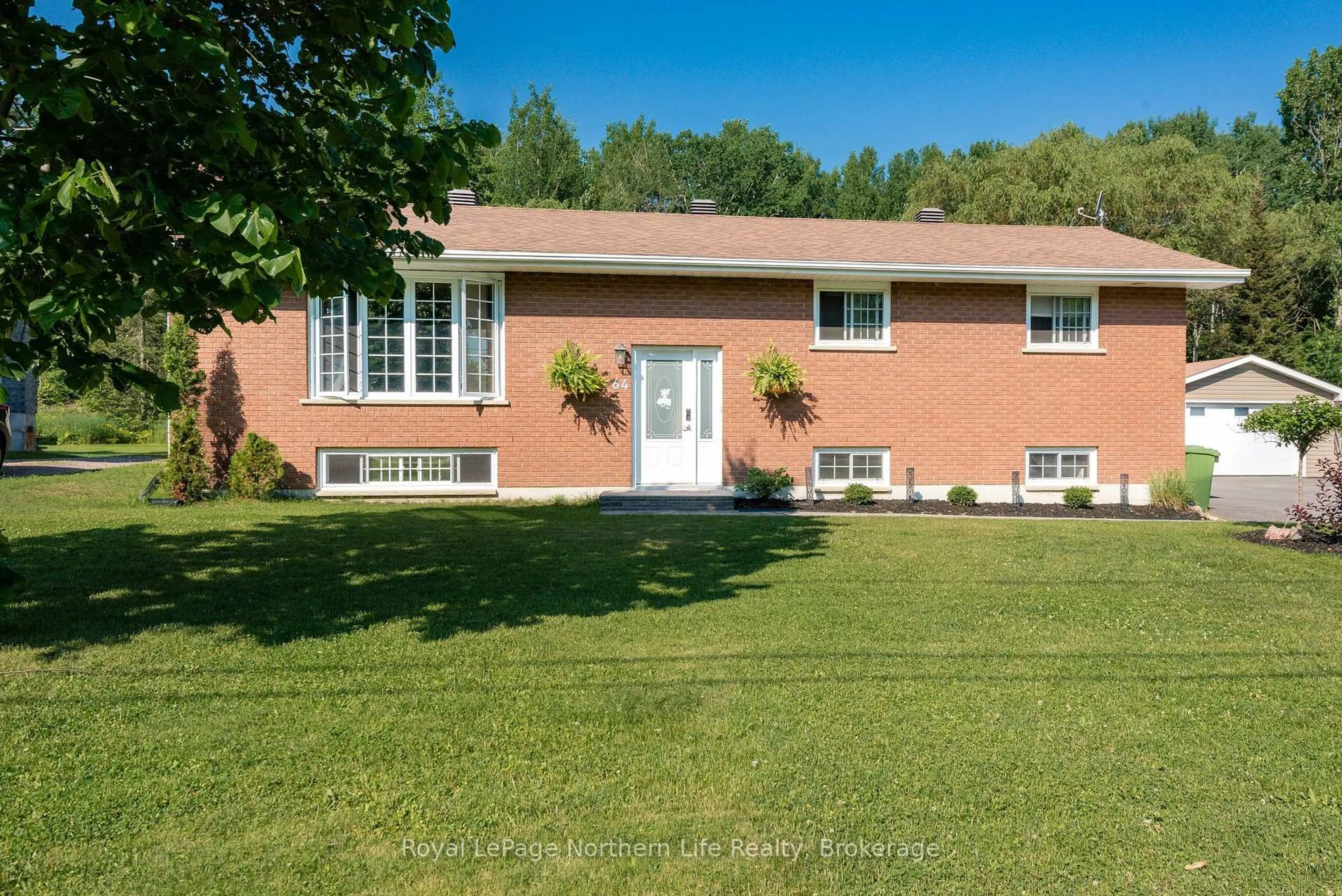 Home with brick exterior material, unknown for 64 Eglington Rd, Callander Ontario P0H 1H0