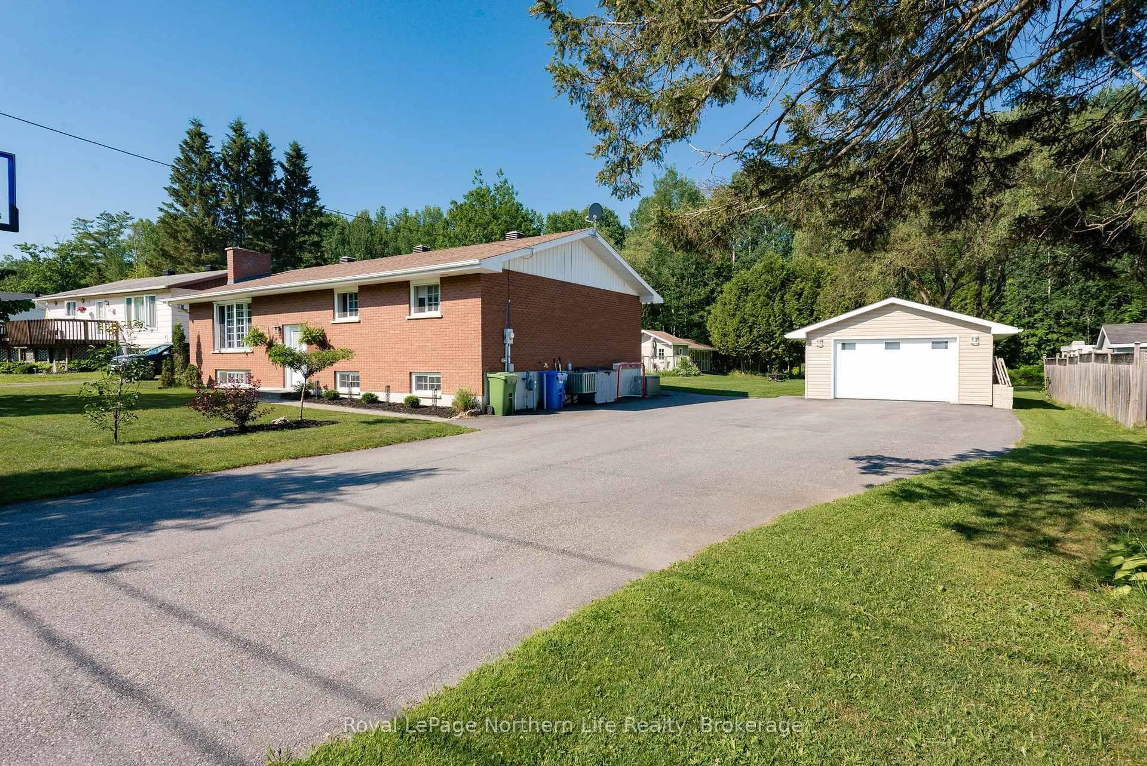 A pic from outside/outdoor area/front of a property/back of a property/a pic from drone, street for 64 Eglington Rd, Callander Ontario P0H 1H0