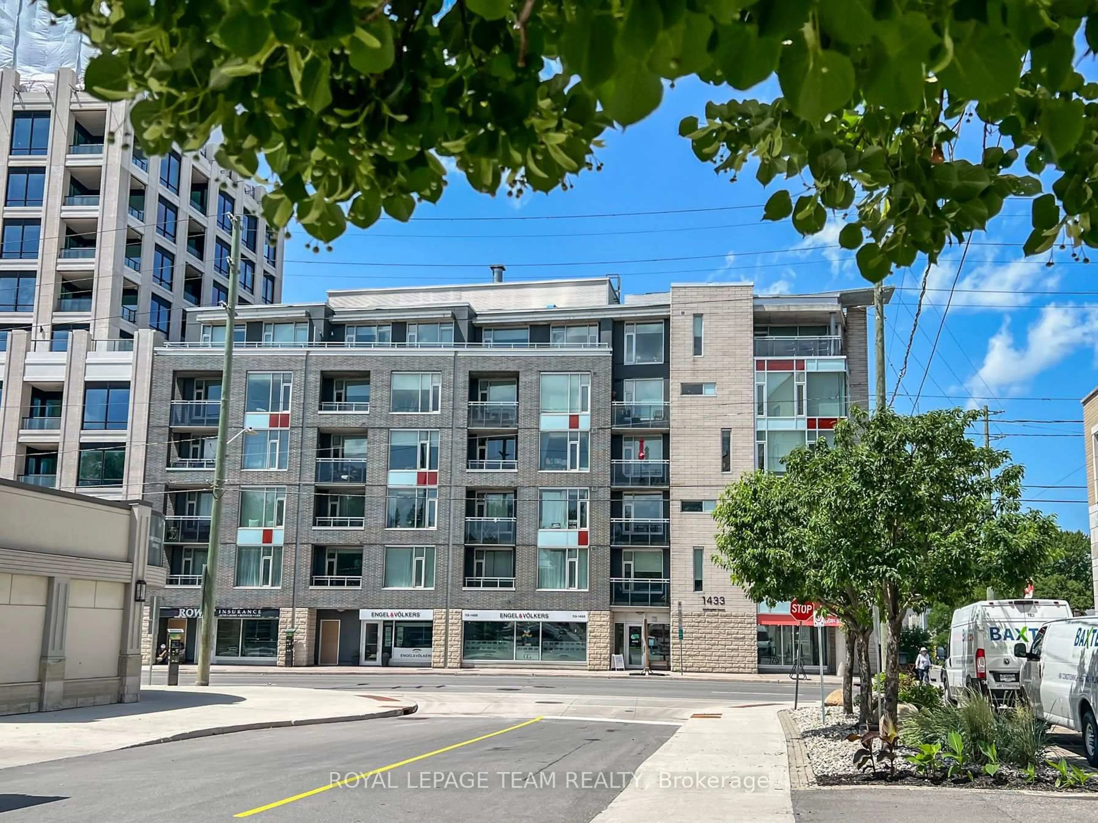 A pic from outside/outdoor area/front of a property/back of a property/a pic from drone, street for 1433 WELLINGTON St #302, Ottawa Ontario K1Y 2X4