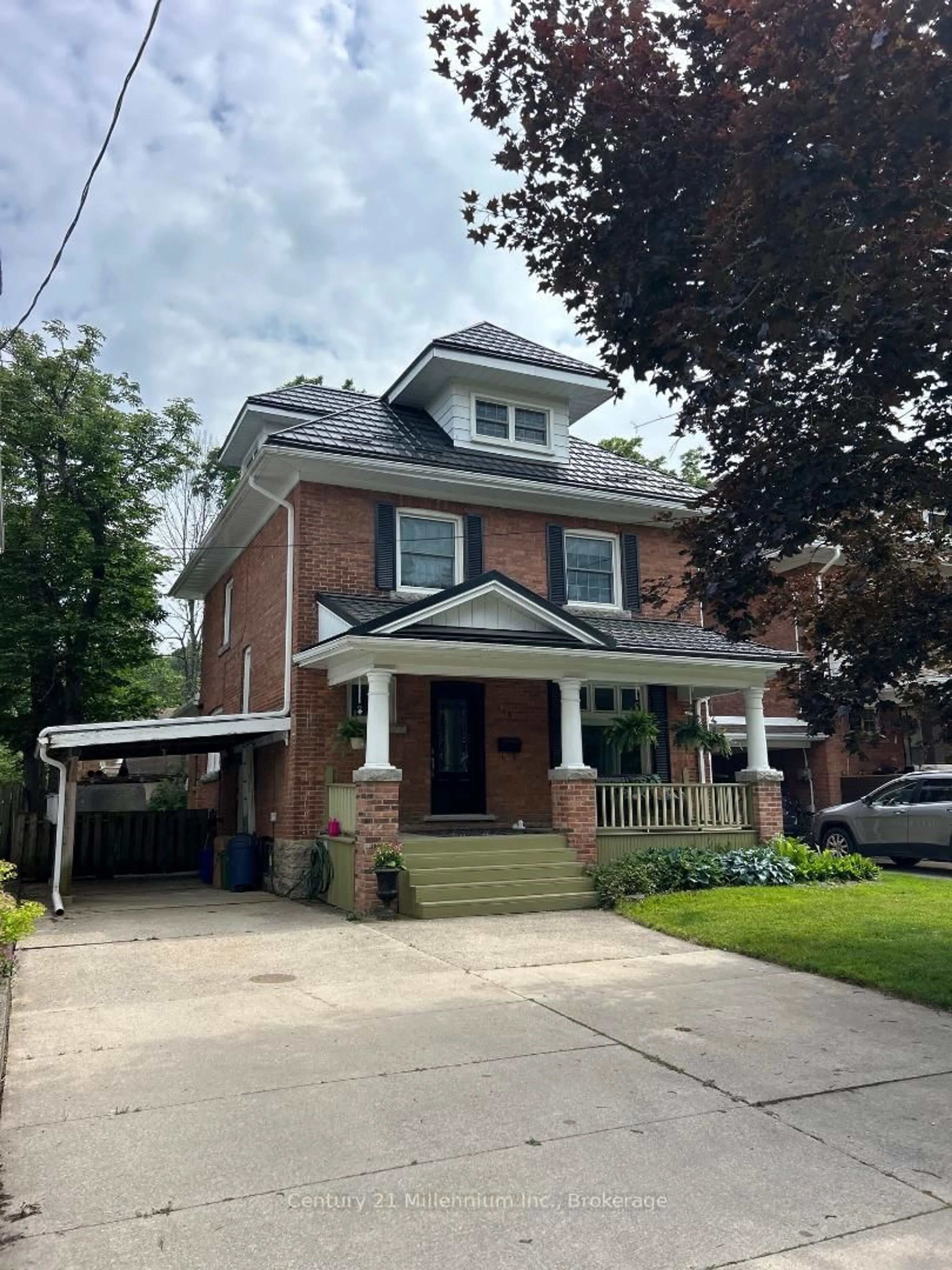 Home with brick exterior material, street for 129 4th St, Owen Sound Ontario N4K 3J8