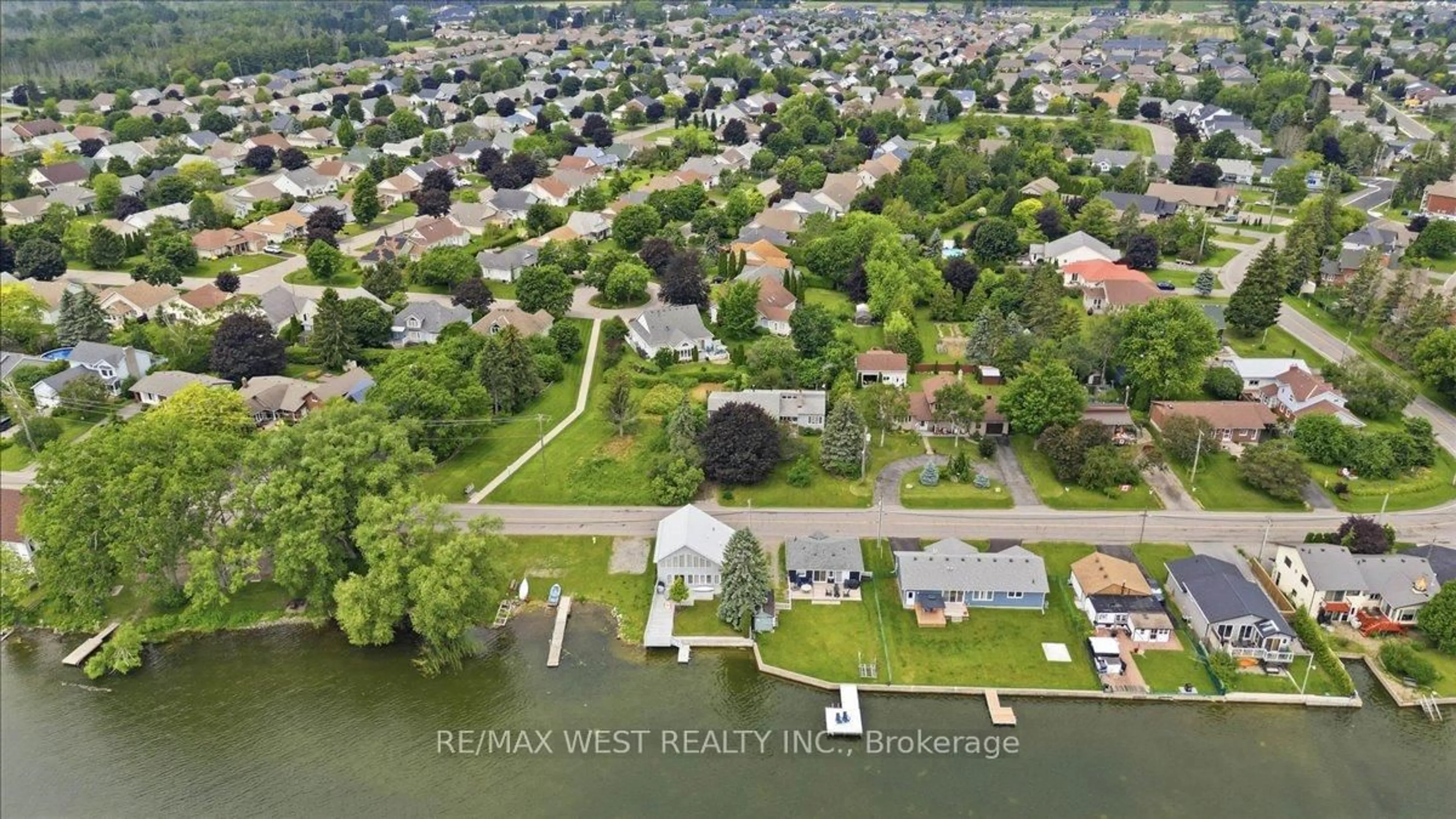 A pic from outside/outdoor area/front of a property/back of a property/a pic from drone, water/lake/river/ocean view for 122 Harbour St, Brighton Ontario K0K 1H0