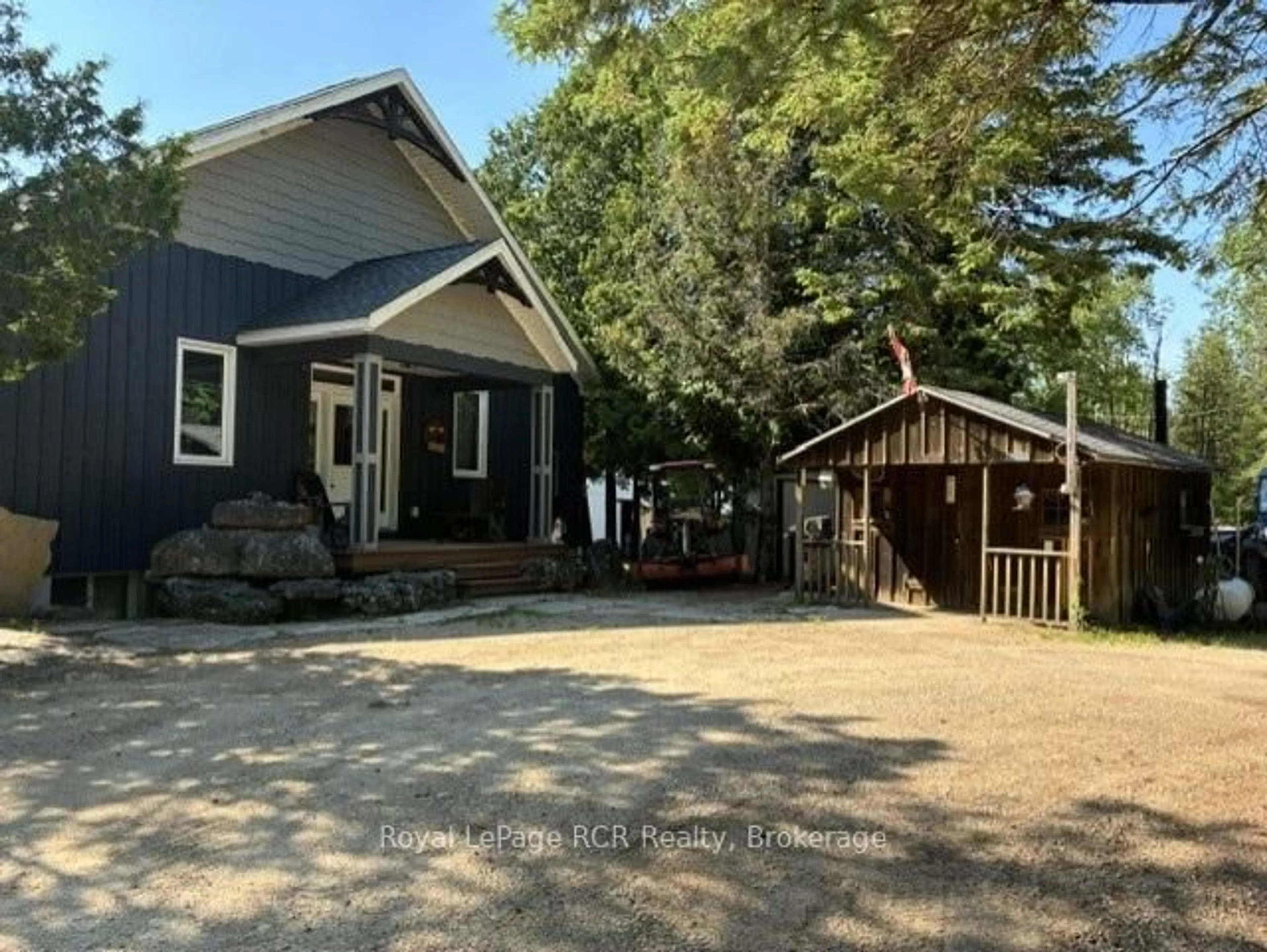 A pic from outside/outdoor area/front of a property/back of a property/a pic from drone, street for 19 Redgate Rd, South Bruce Peninsula Ontario N0H 2T0