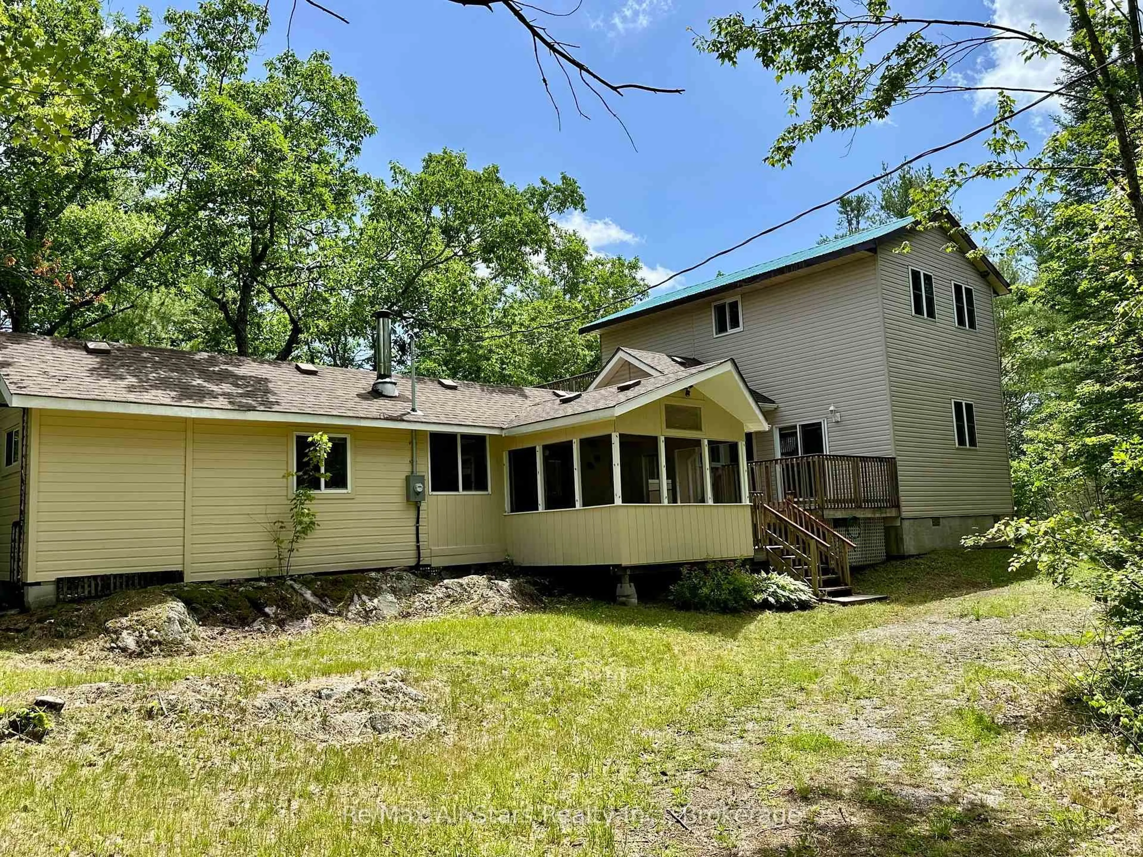 A pic from outside/outdoor area/front of a property/back of a property/a pic from drone, unknown for 222 Mississagua Dam Rd, Trent Lakes Ontario K0L 1J0