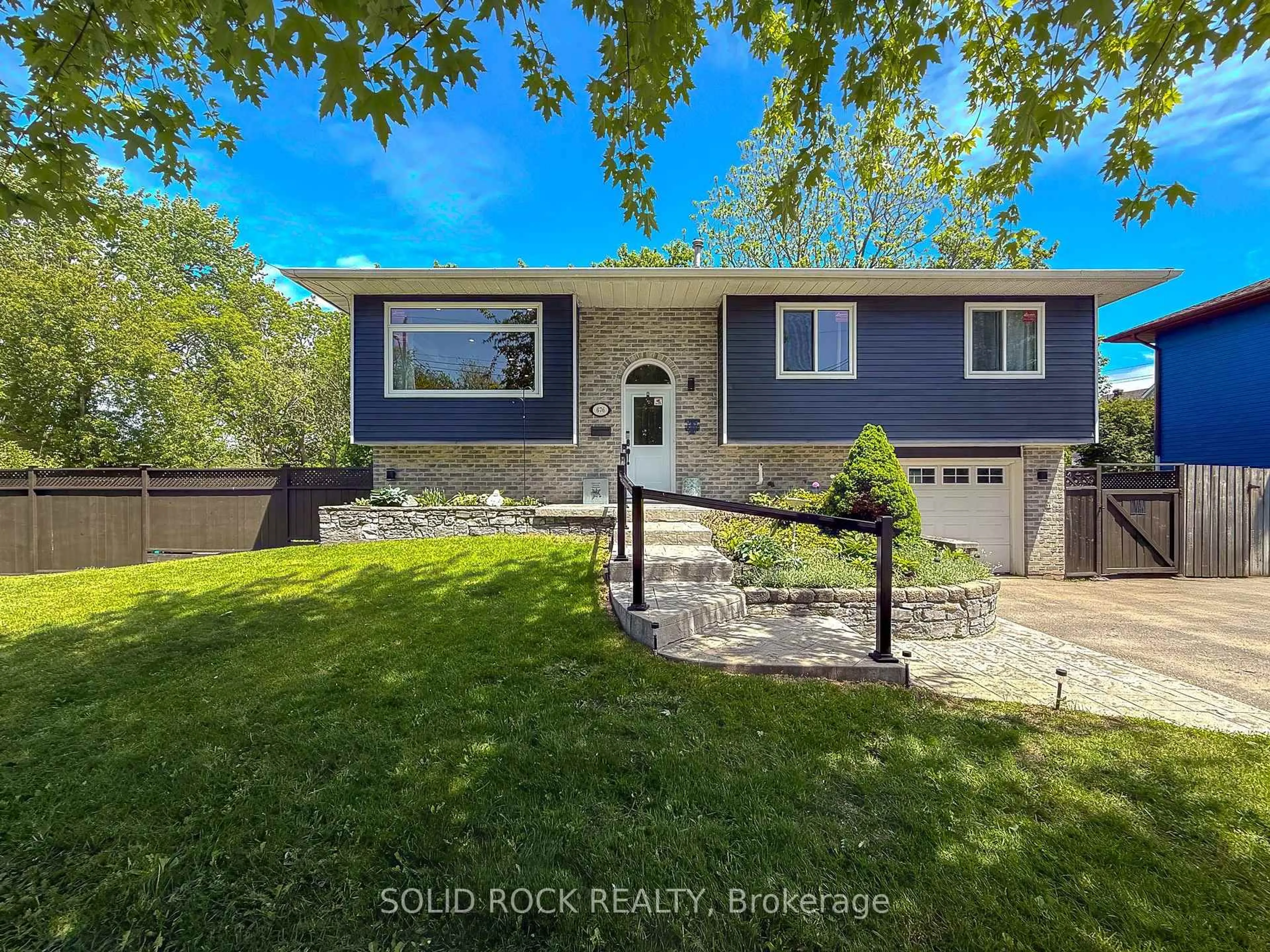 A pic from outside/outdoor area/front of a property/back of a property/a pic from drone, street for 676 Centre St, Kingston Ontario K7M 5E4