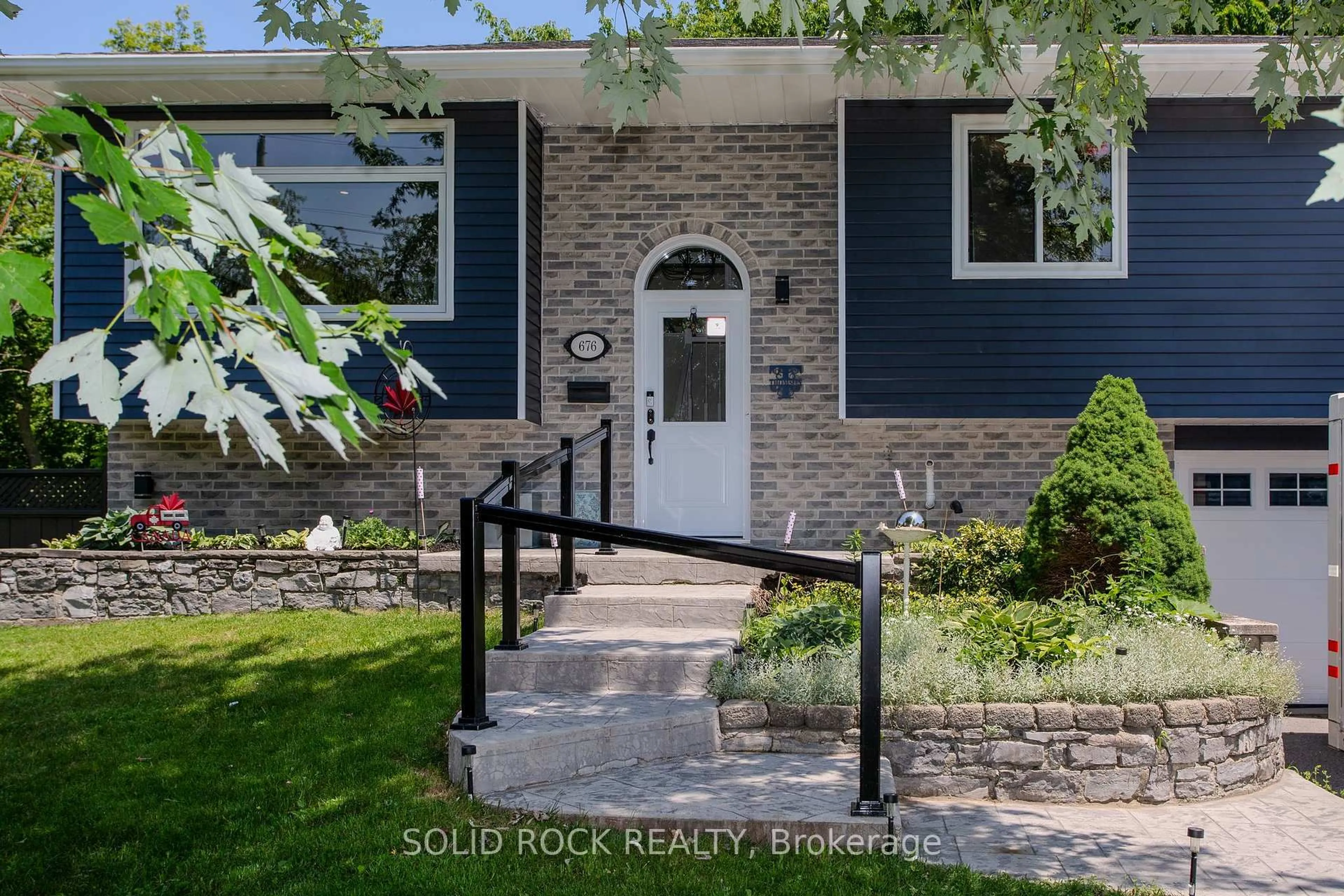 Home with brick exterior material, street for 676 Centre St, Kingston Ontario K7M 5E4