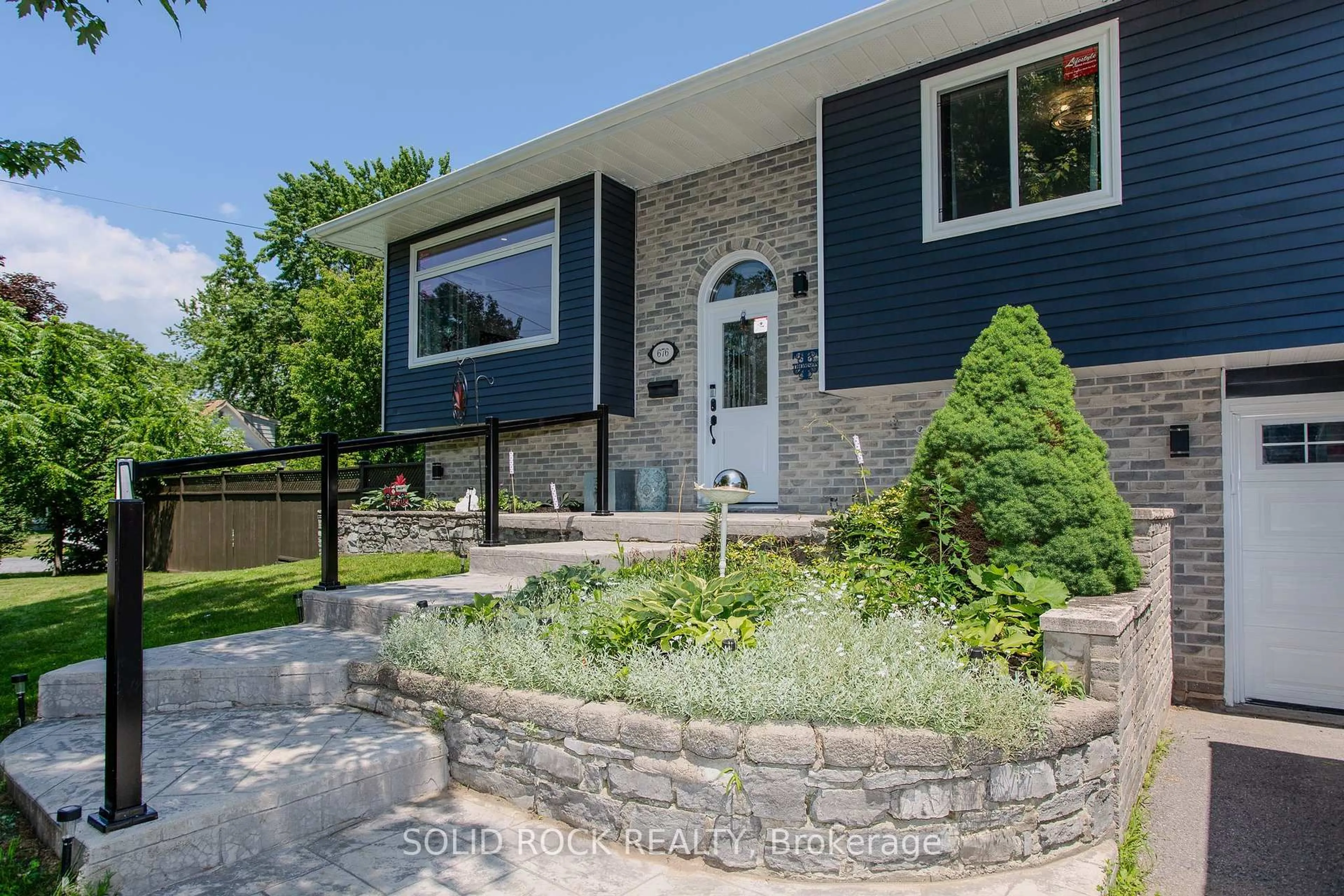 Home with brick exterior material, street for 676 Centre St, Kingston Ontario K7M 5E4