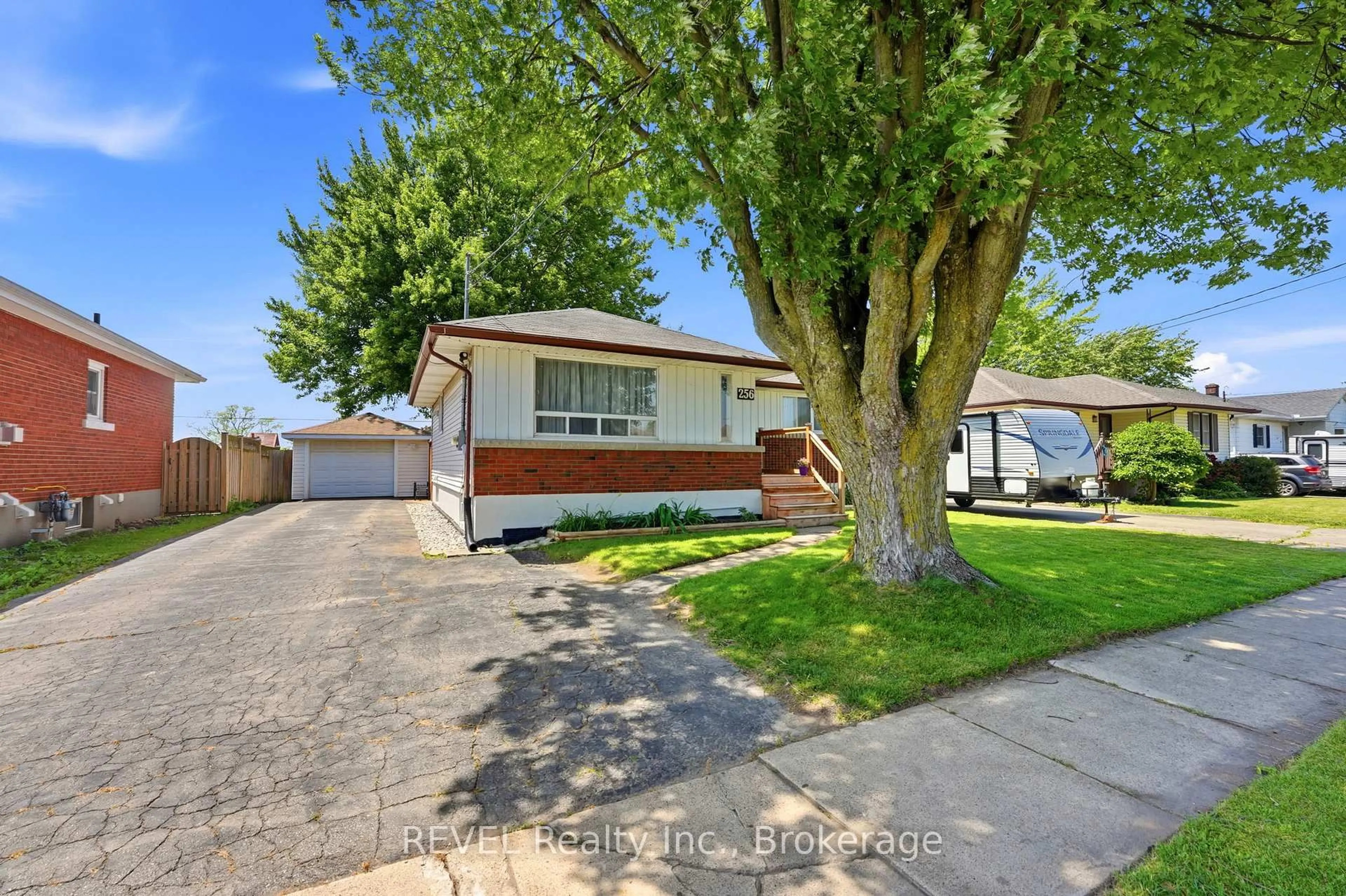 Home with vinyl exterior material, street for 256 Clarke St, Port Colborne Ontario L3K 2G5