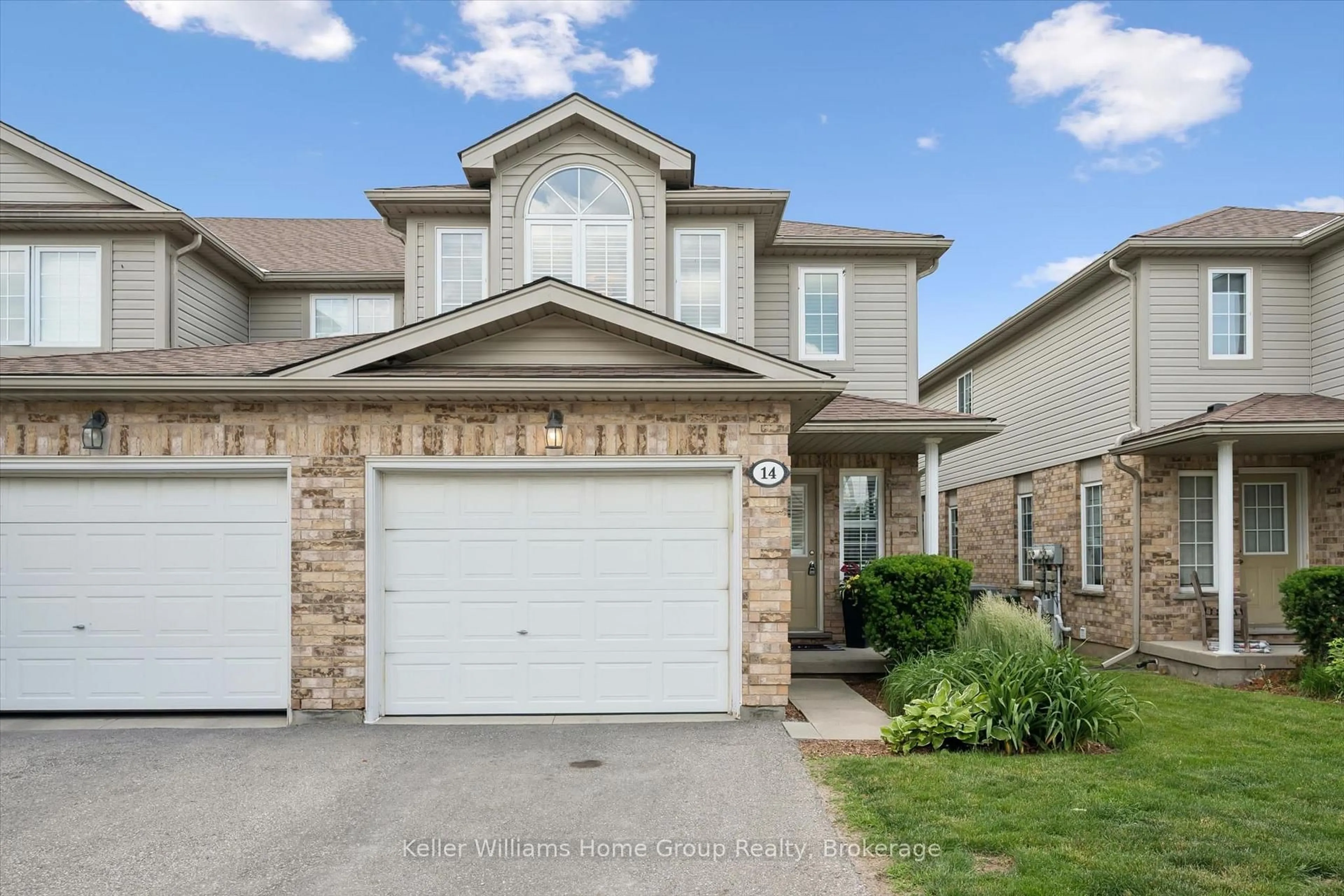 Home with brick exterior material, street for 210 Dawn Ave #14, Guelph Ontario N1G 5L5