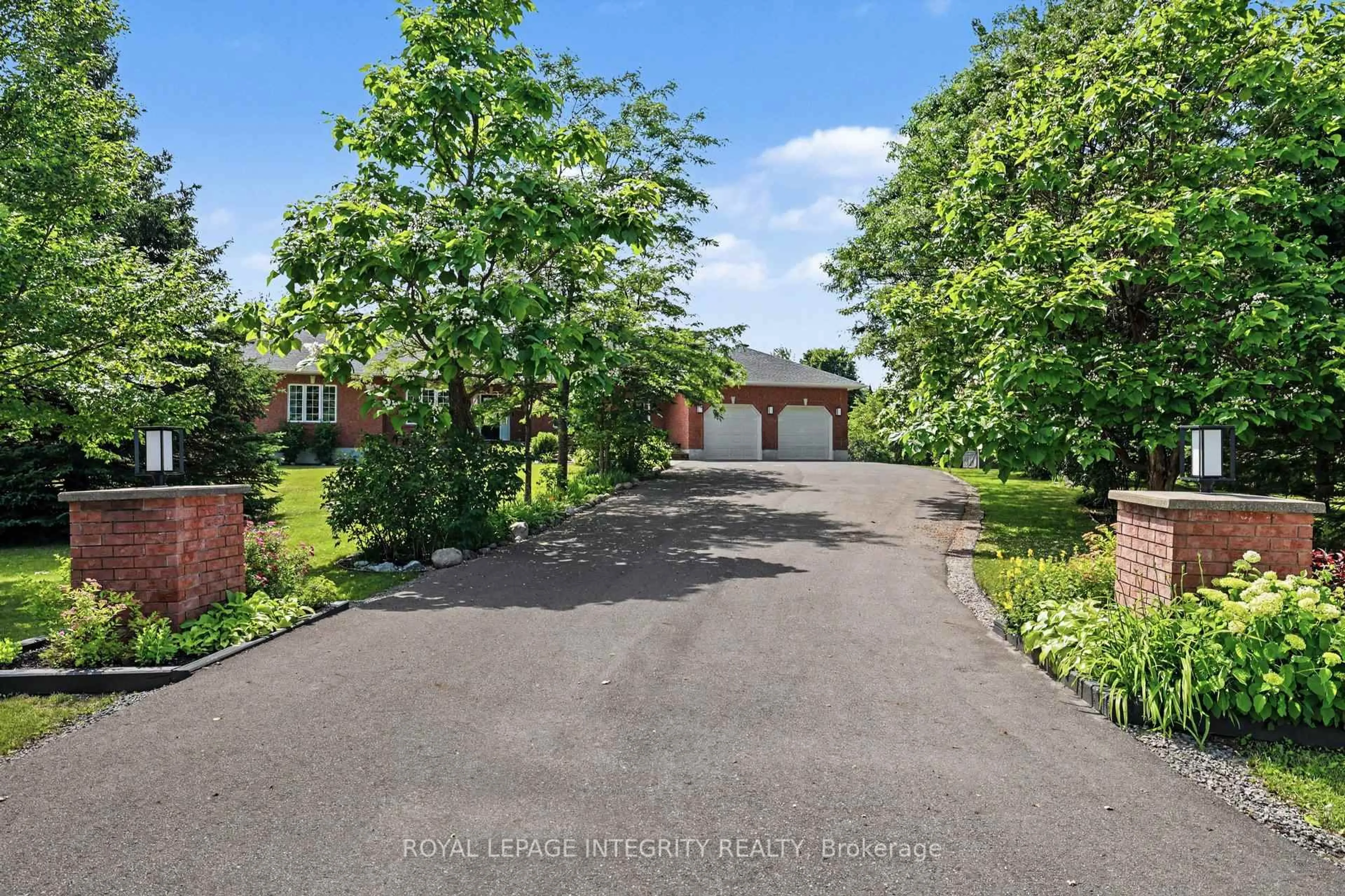A pic from outside/outdoor area/front of a property/back of a property/a pic from drone, street for 2602 Manotick Station Rd, Osgoode Ontario K0A 2W0