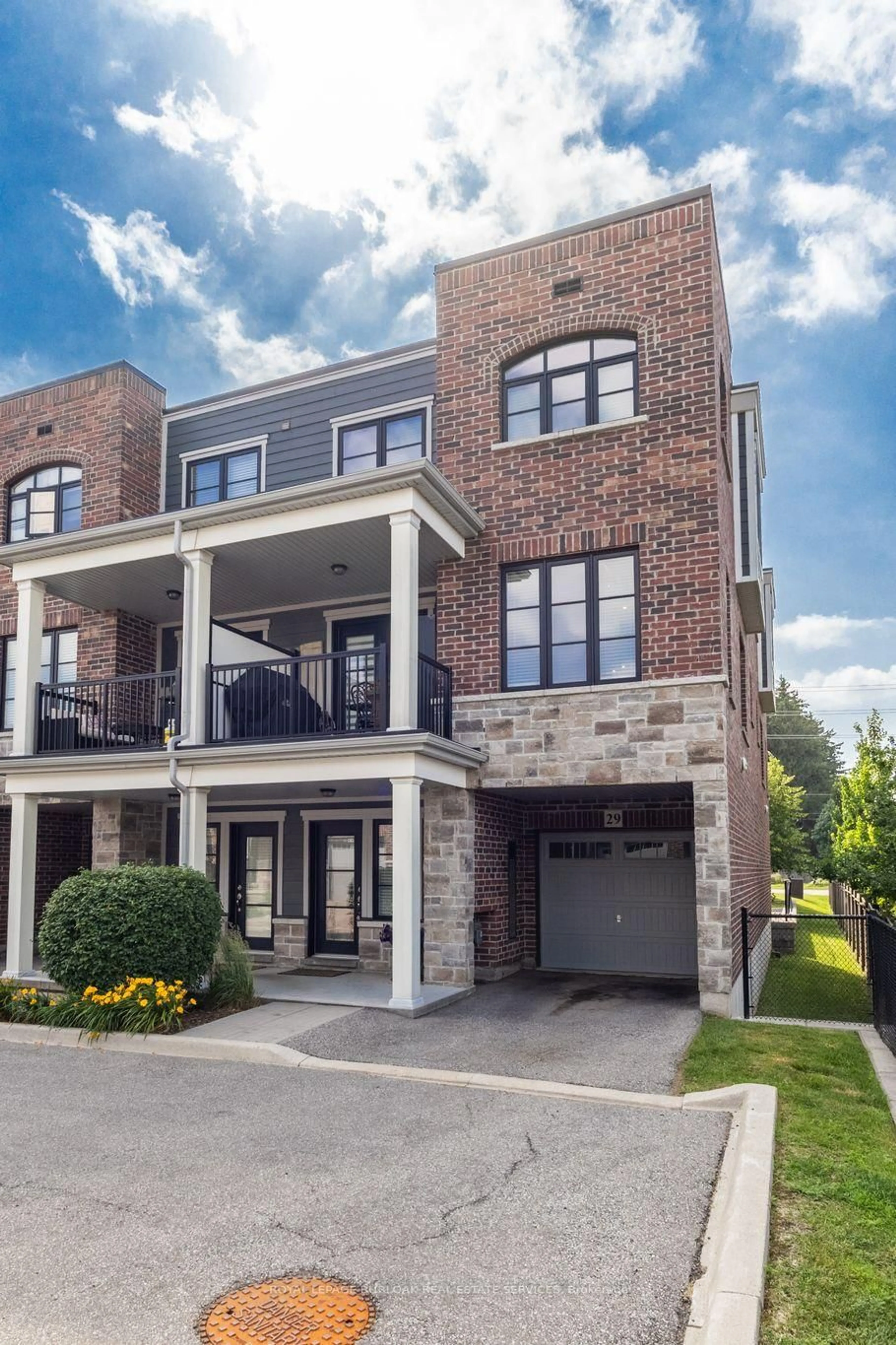 Home with brick exterior material, street for 219 Dundas St #29, Hamilton Ontario L9H 7H8