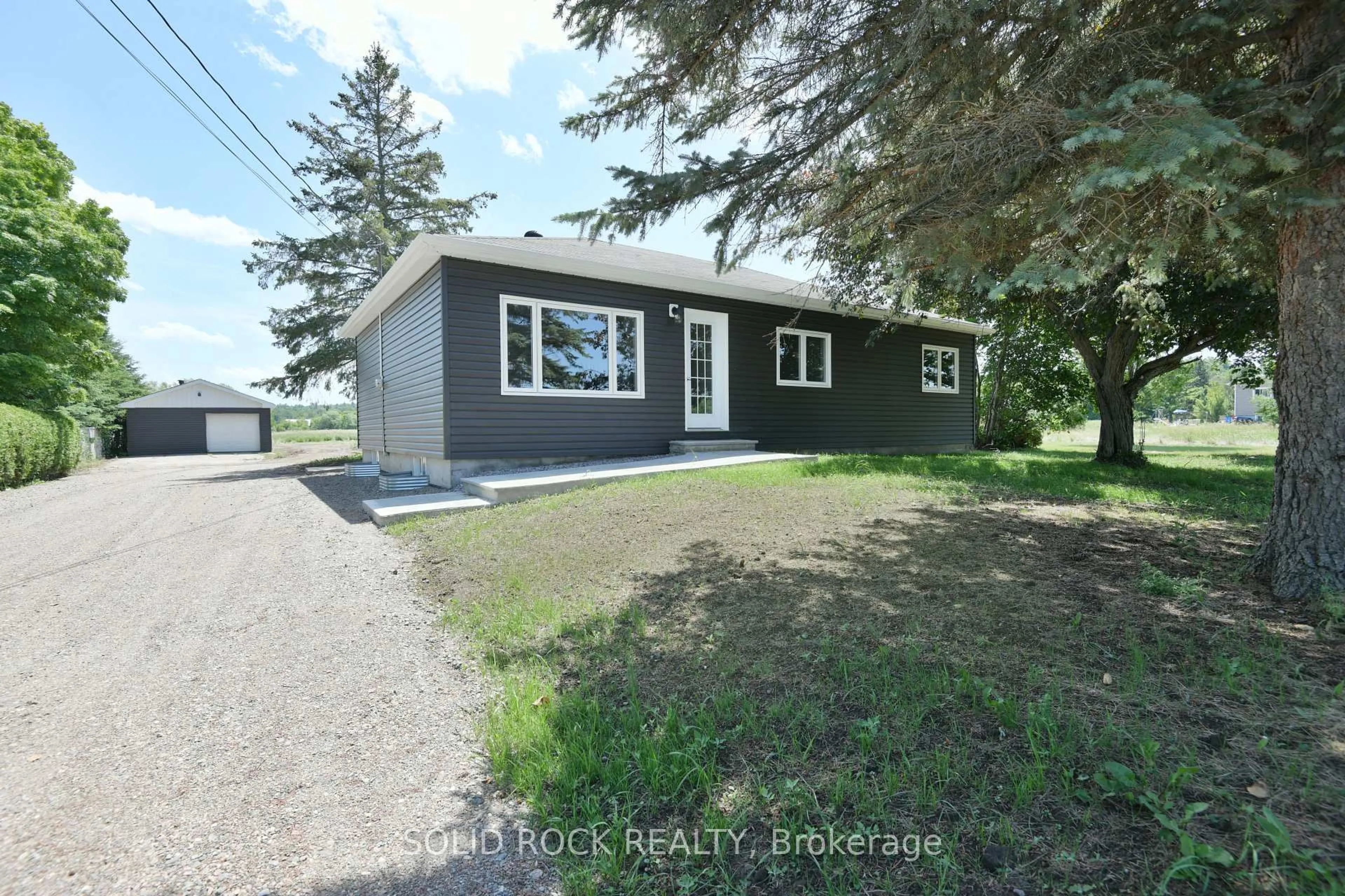 A pic from outside/outdoor area/front of a property/back of a property/a pic from drone, street for 1097 132 Highway, Renfrew Ontario K7V 3Z5