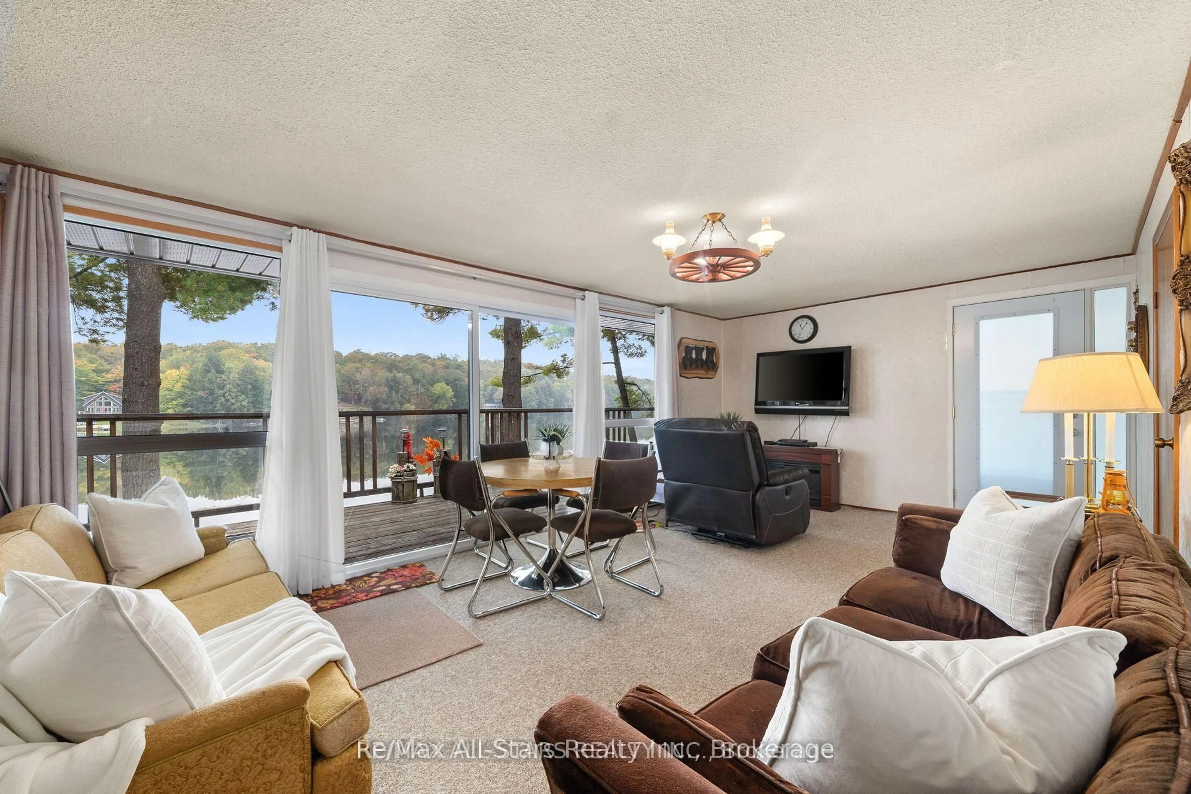 Living room with furniture, unknown for 1006 Youngs Rd #Cottage # 9, Muskoka Lakes Ontario P0B 1J0