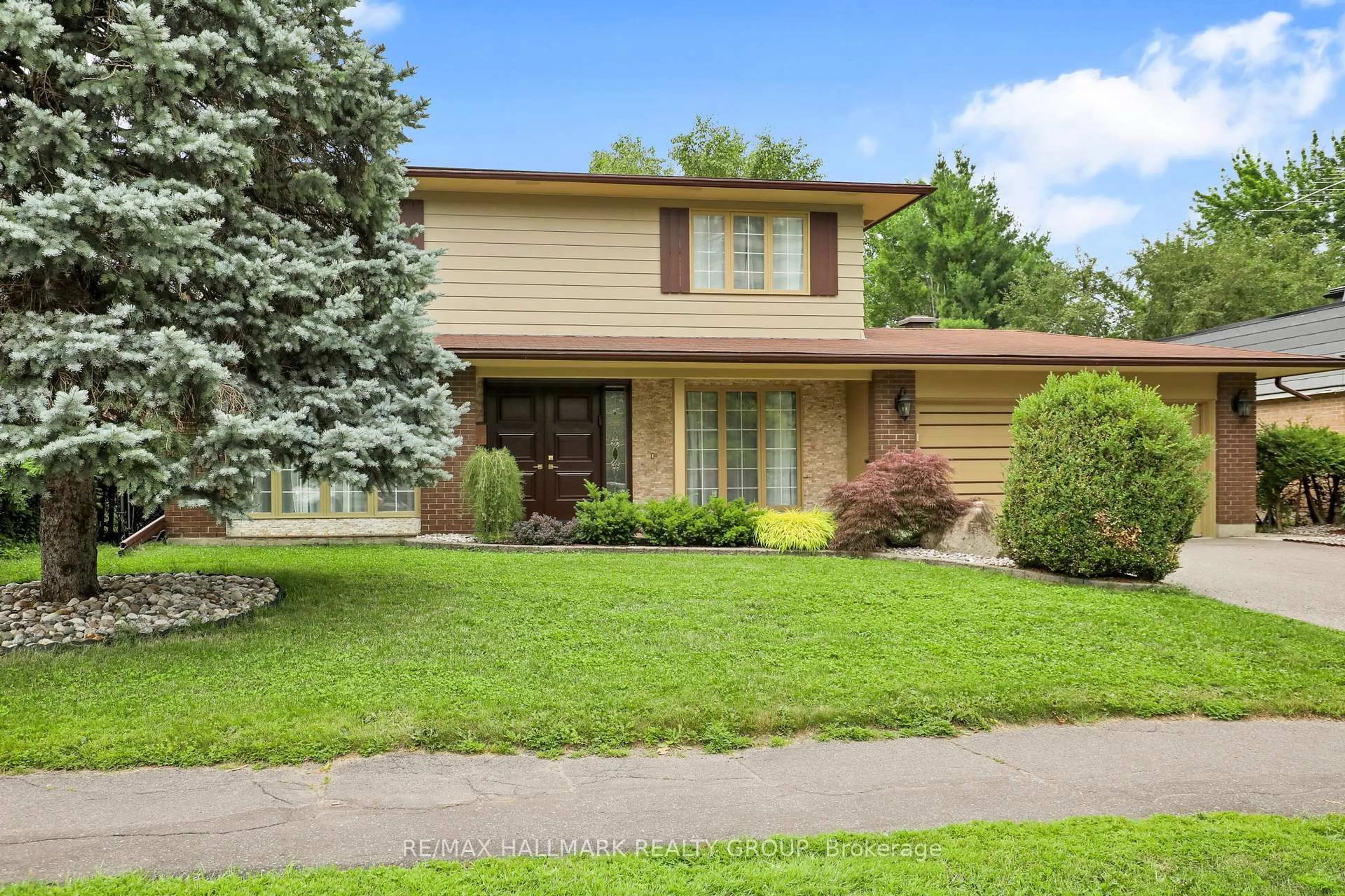 Home with brick exterior material, street for 1712 Playfair Dr, Ottawa Ontario K1H 5S6