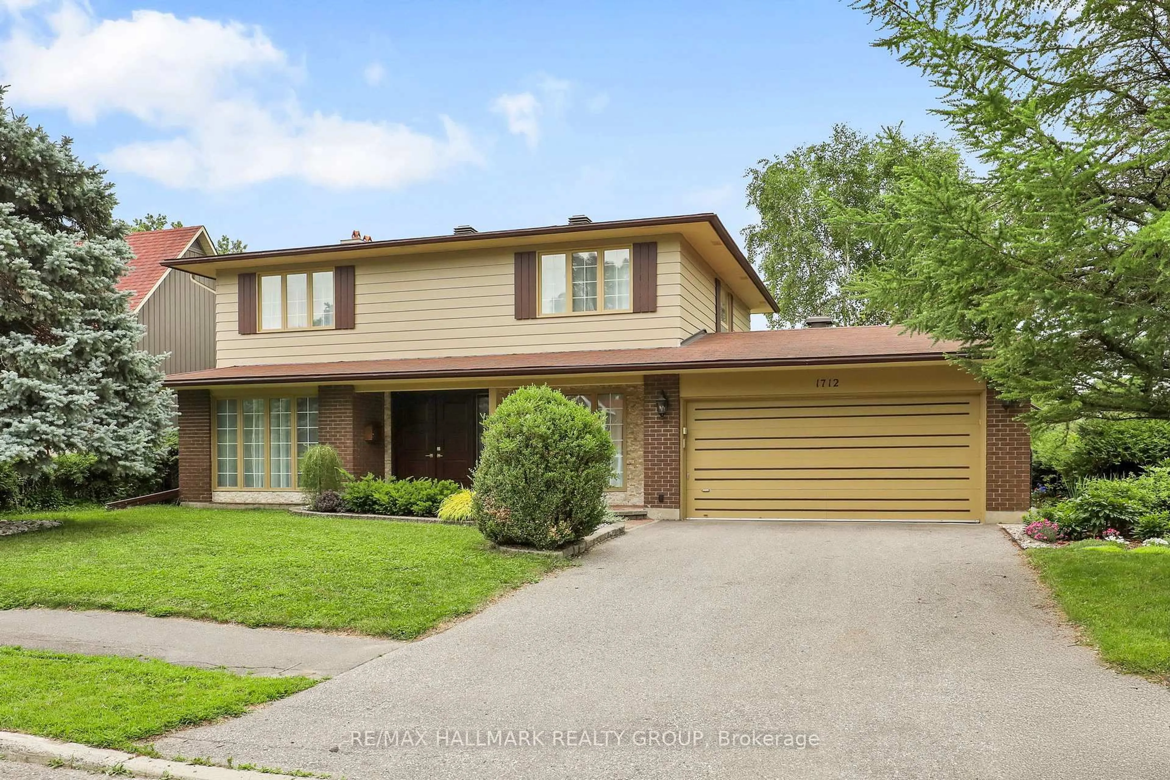 Home with brick exterior material, street for 1712 Playfair Dr, Ottawa Ontario K1H 5S6