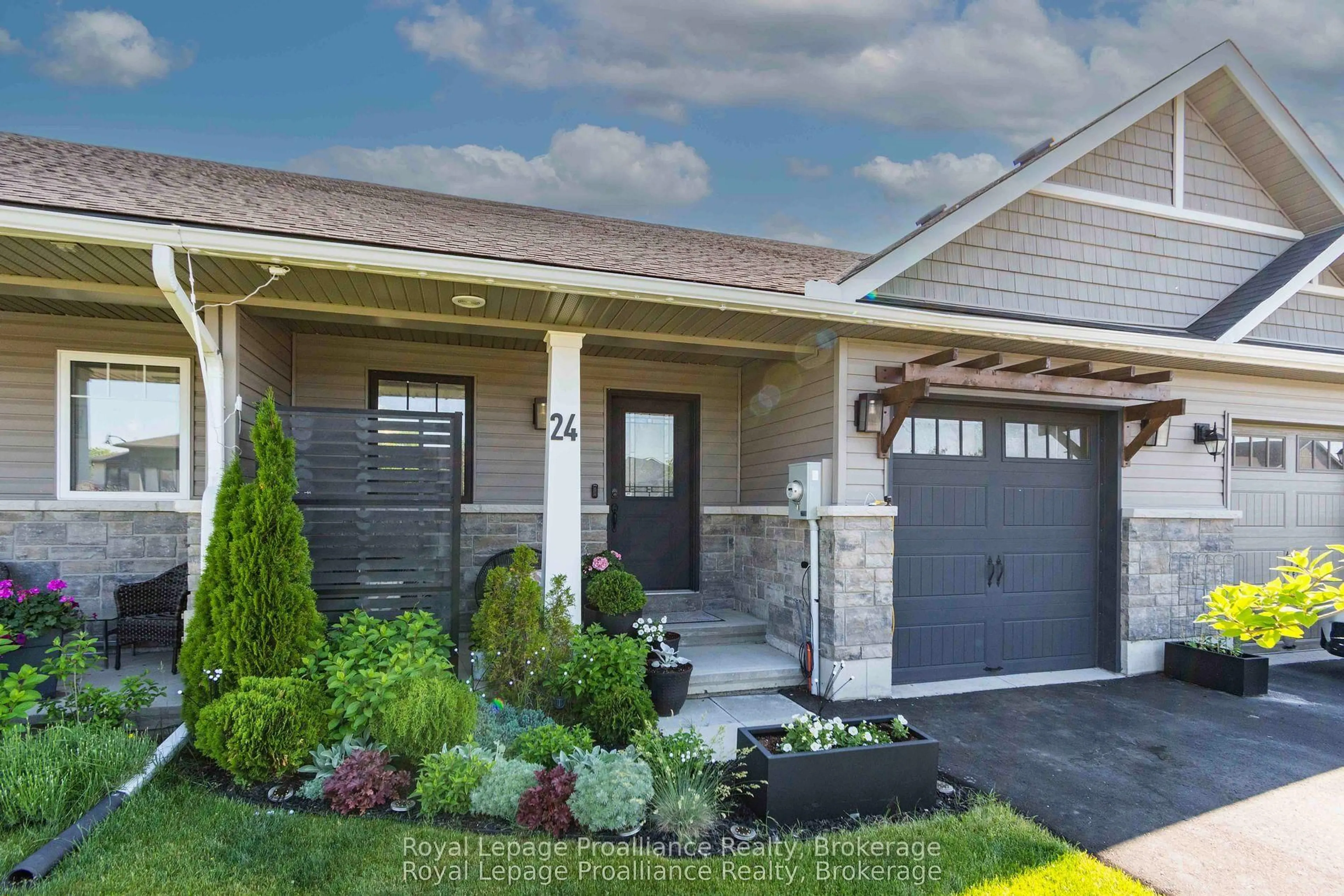 Home with brick exterior material, street for 24 Buchanan Ave, Prince Edward County Ontario K0K 2T0